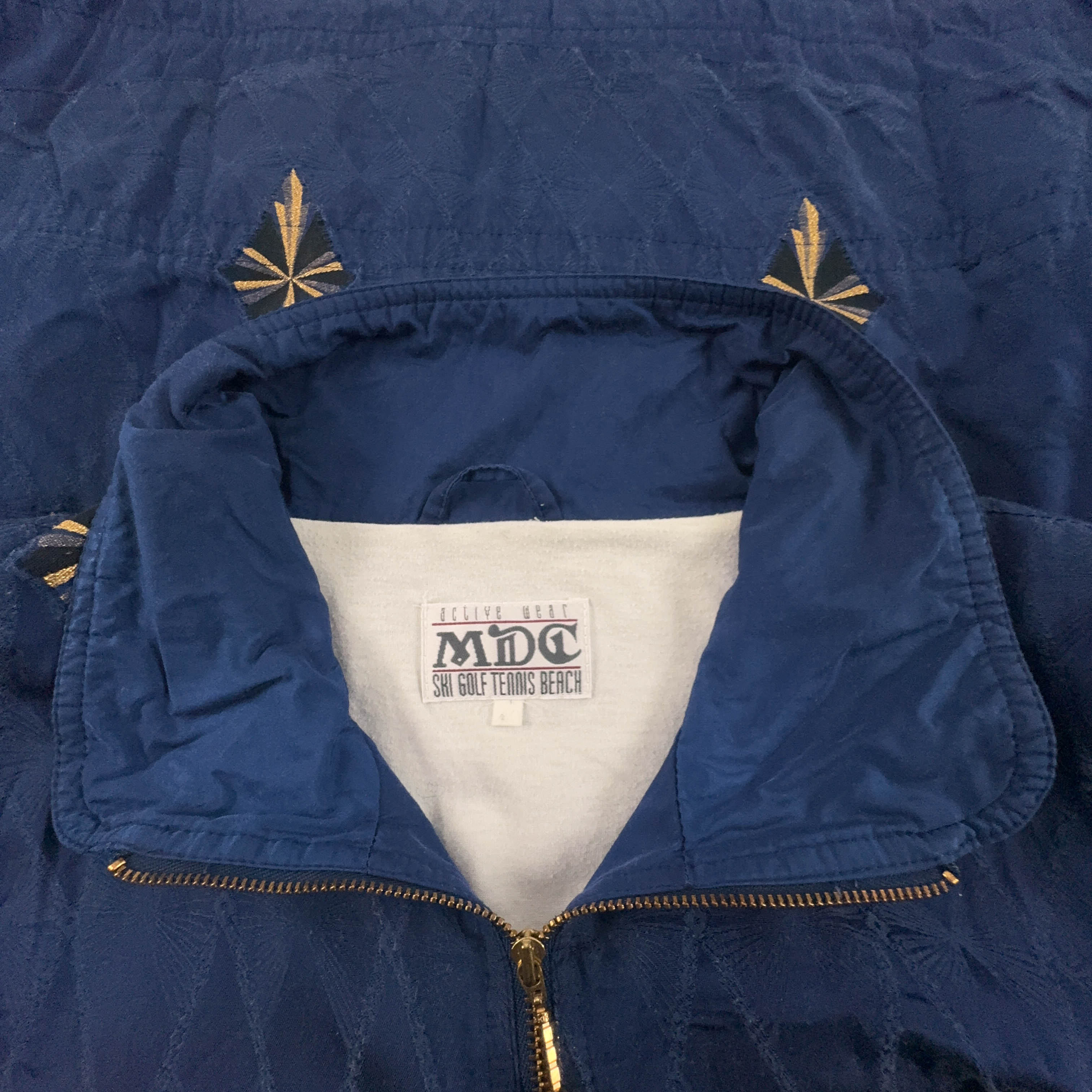 Giacca a vento Vintage blu e oro con ricami e zip anni 80 90 - Taglia 40 uomo