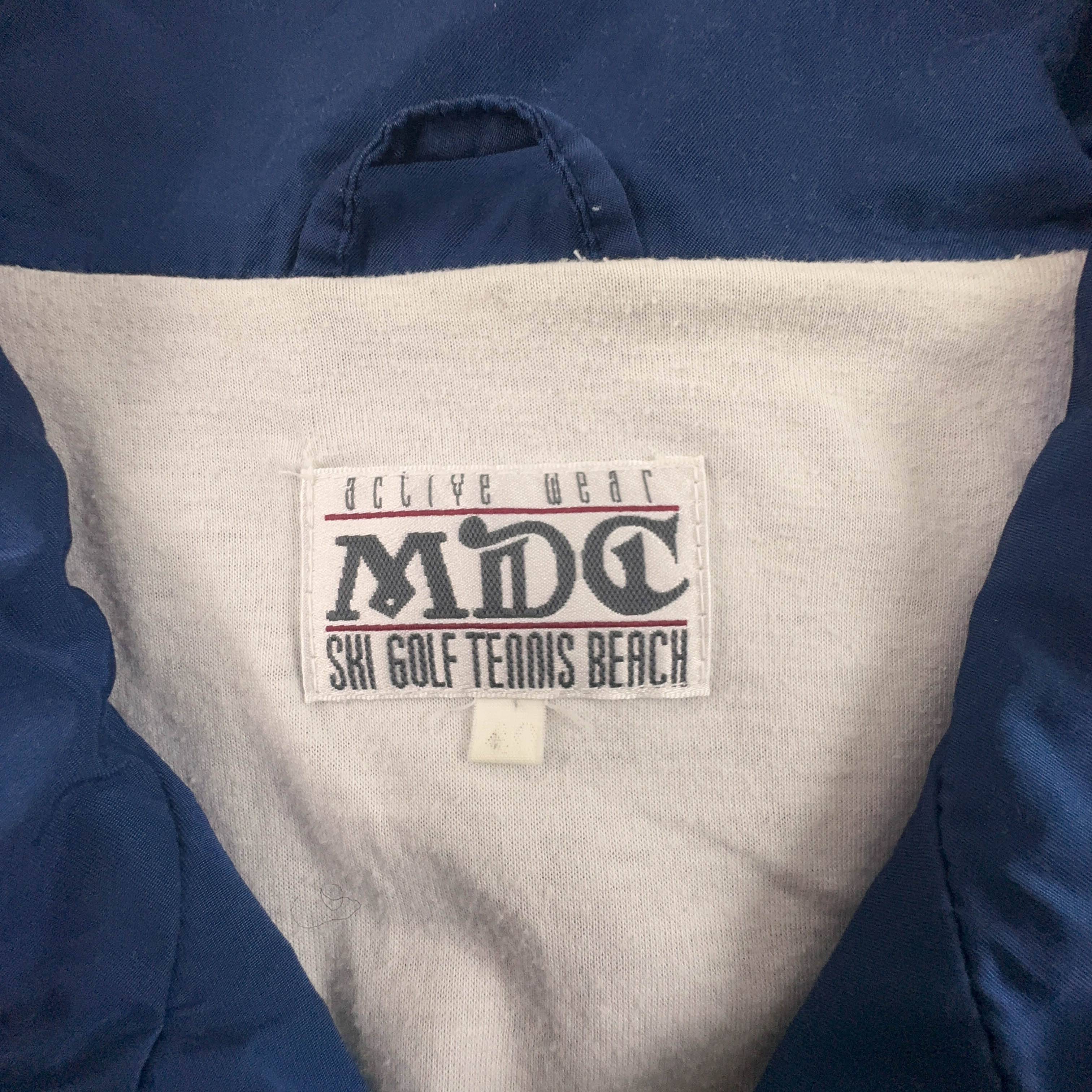Giacca a vento Vintage blu e oro con ricami e zip anni 80 90 - Taglia 40 uomo