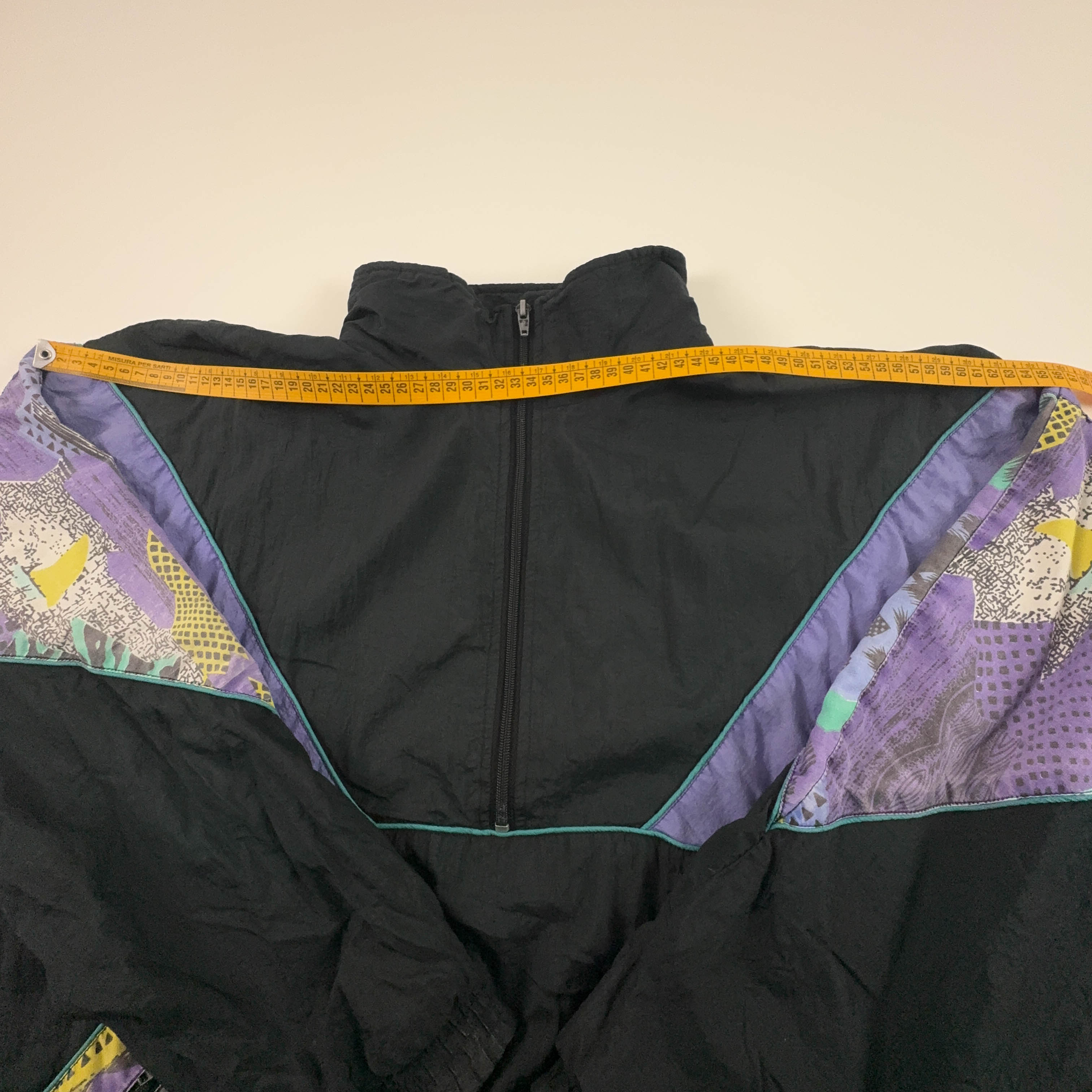 Giacca a vento Vintage nera e viola a fantasia quarter zip anni 80 90 - Taglia M uomo
