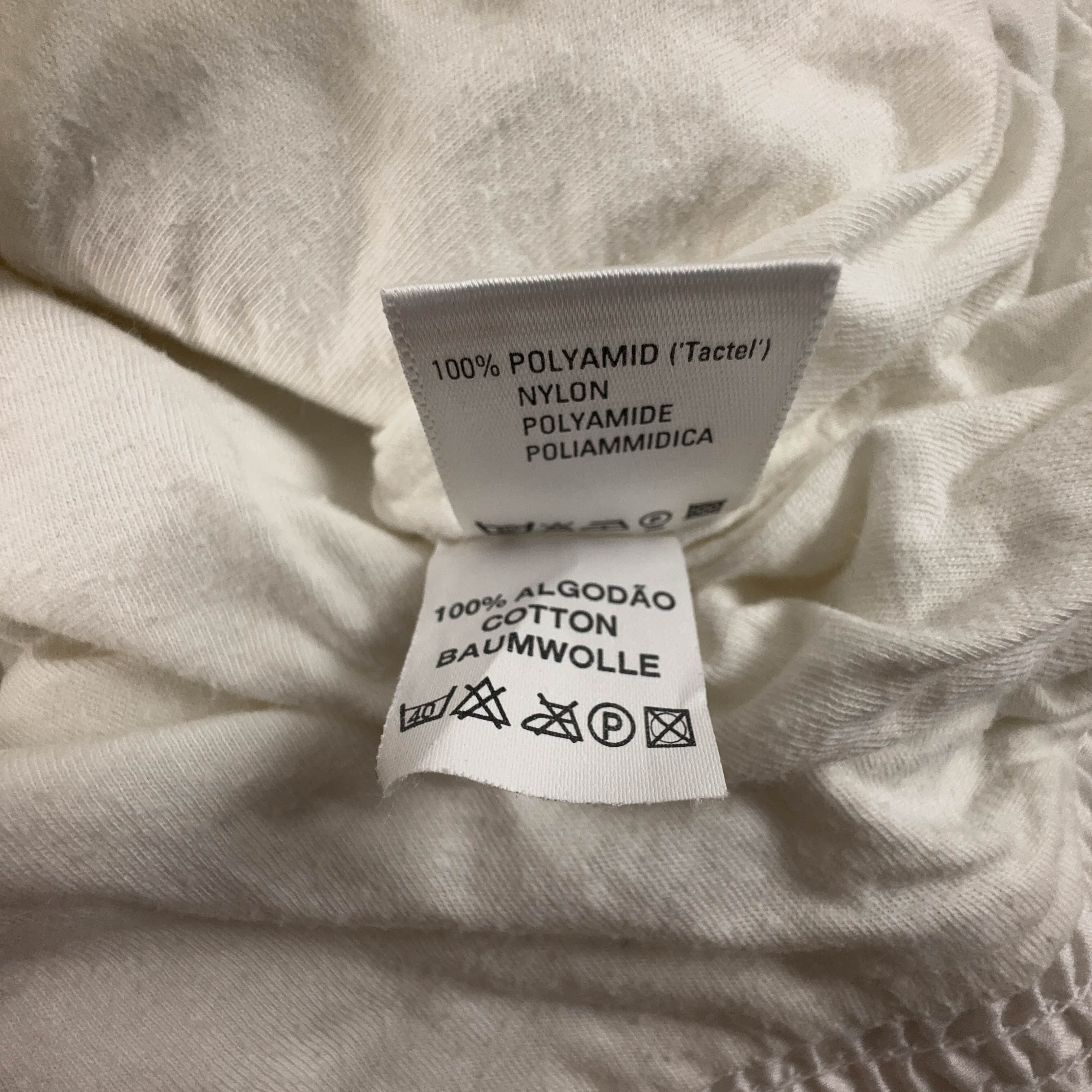 Giacca a vento Vintage bianca e blu a fantasia con zip anni 80 90 - Taglia S uomo