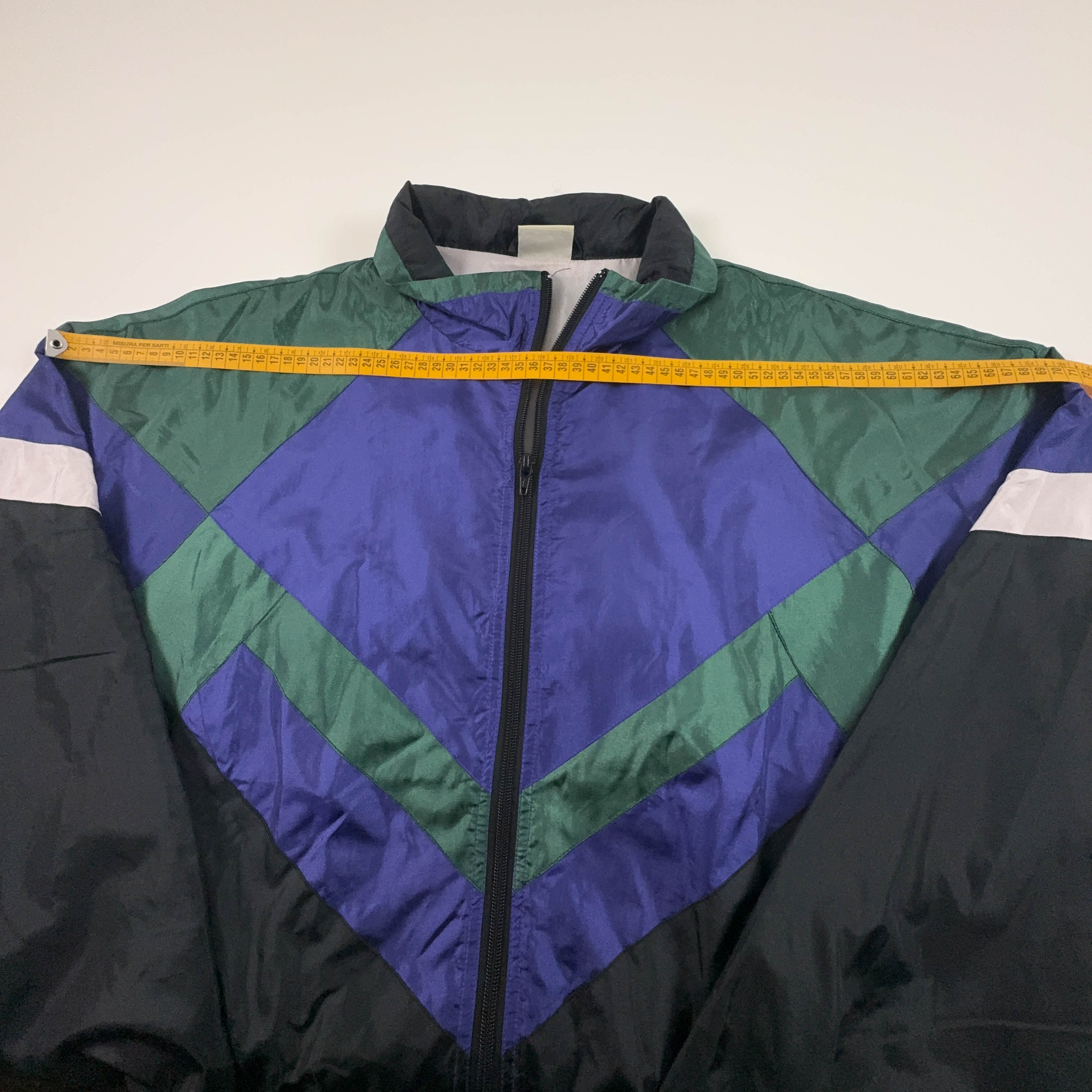 Giacca a vento Vintage verde e viola geometrica con zip anni 80 90 - Taglia XL/XXL uomo