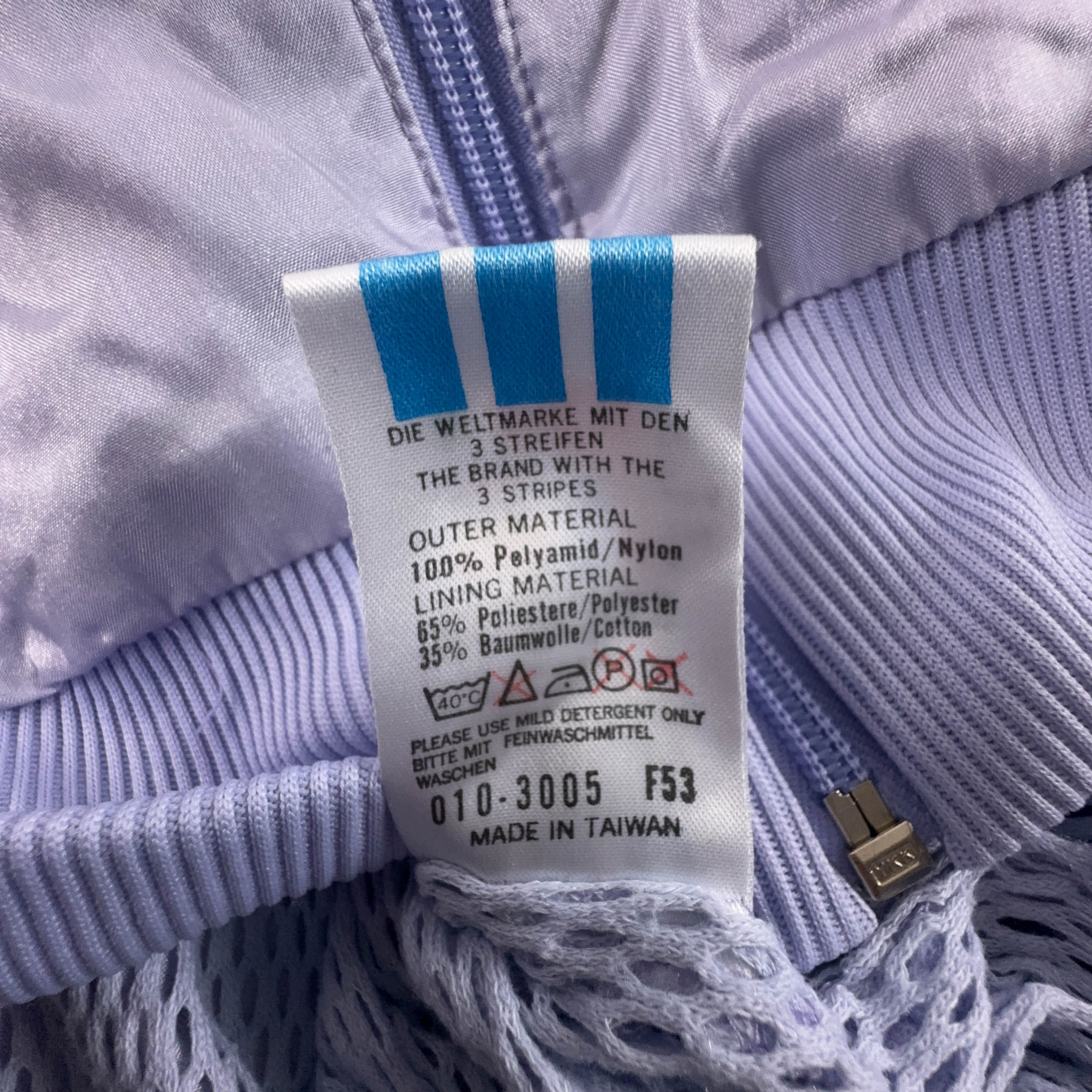 Giacca a vento Adidas Vintage lillà e verde con zip anni 80 90 - Taglia S/M uomo