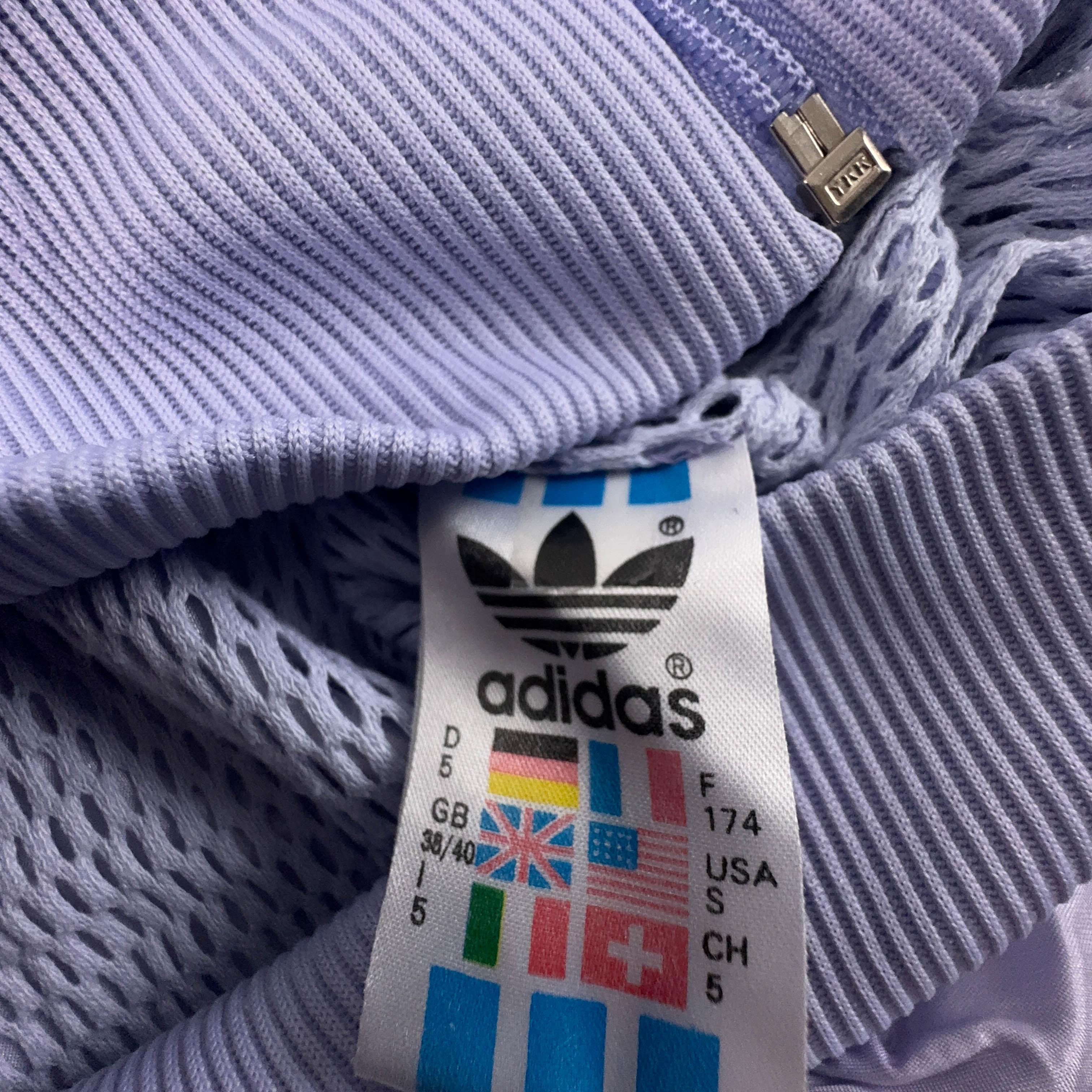 Giacca a vento Adidas Vintage lillà e verde con zip anni 80 90 - Taglia S/M uomo