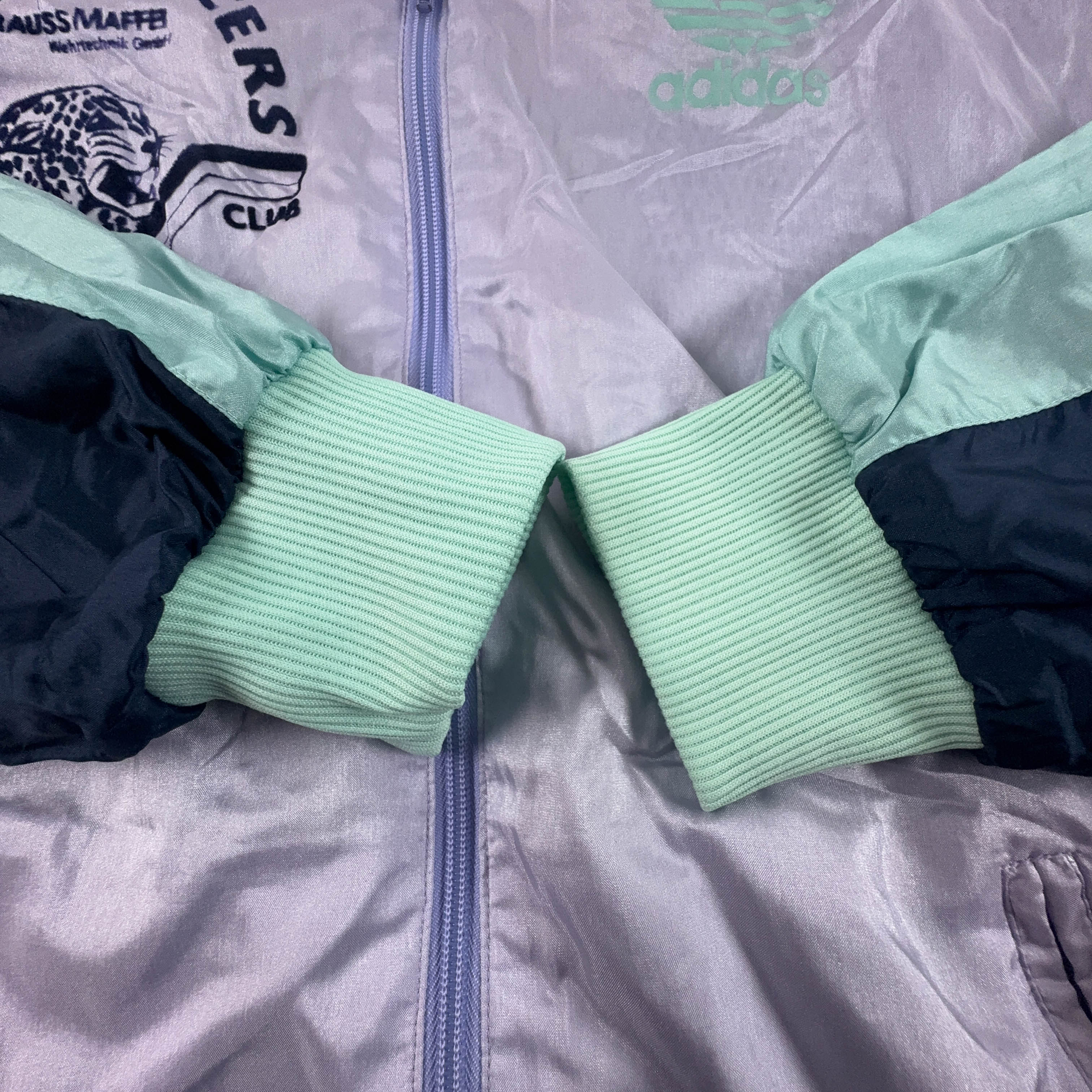 Giacca a vento Adidas Vintage lillà e verde con zip anni 80 90 - Taglia S/M uomo