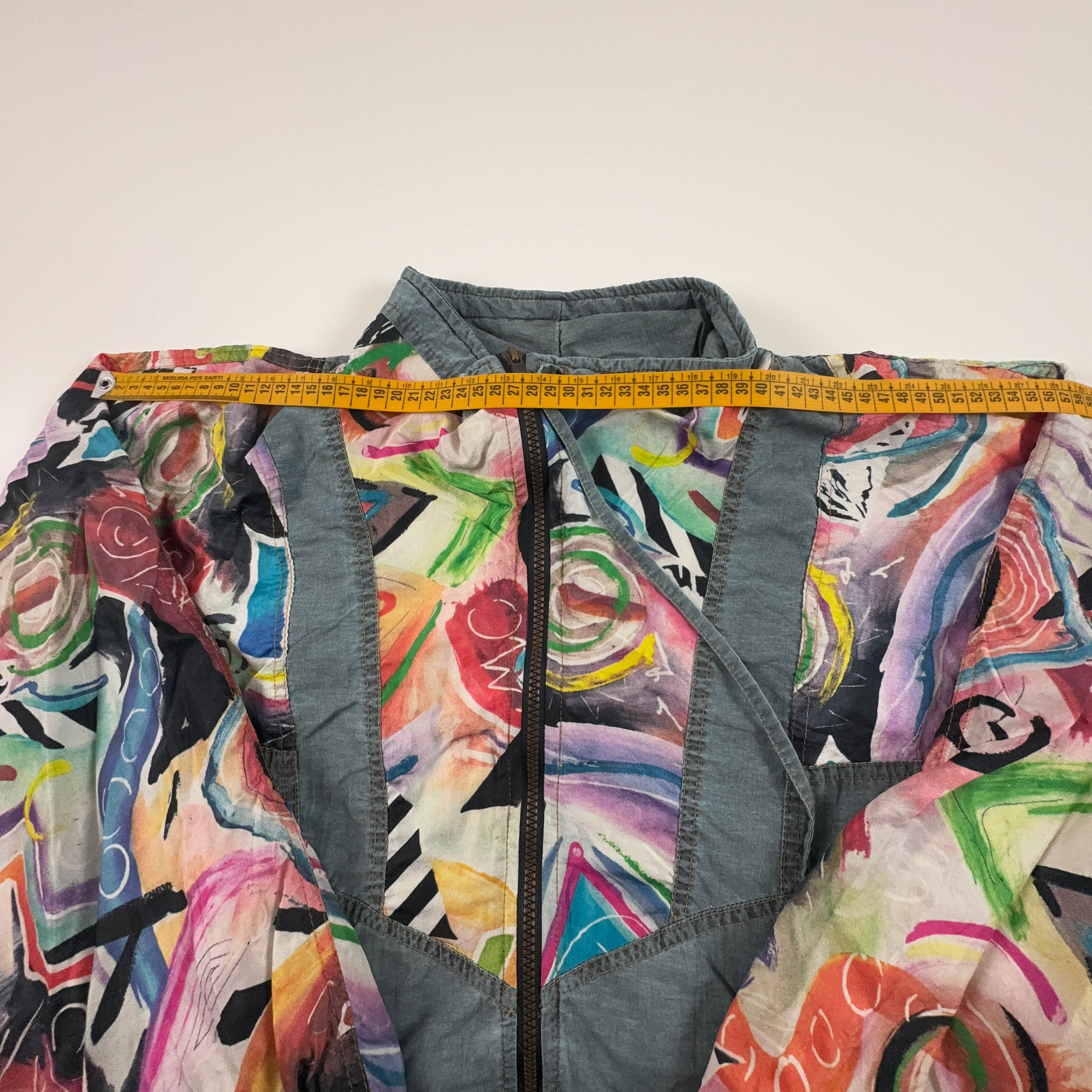 Giacca a vento Vintage grigia a fantasia multicolore anni 80 90 - Taglia S/M uomo