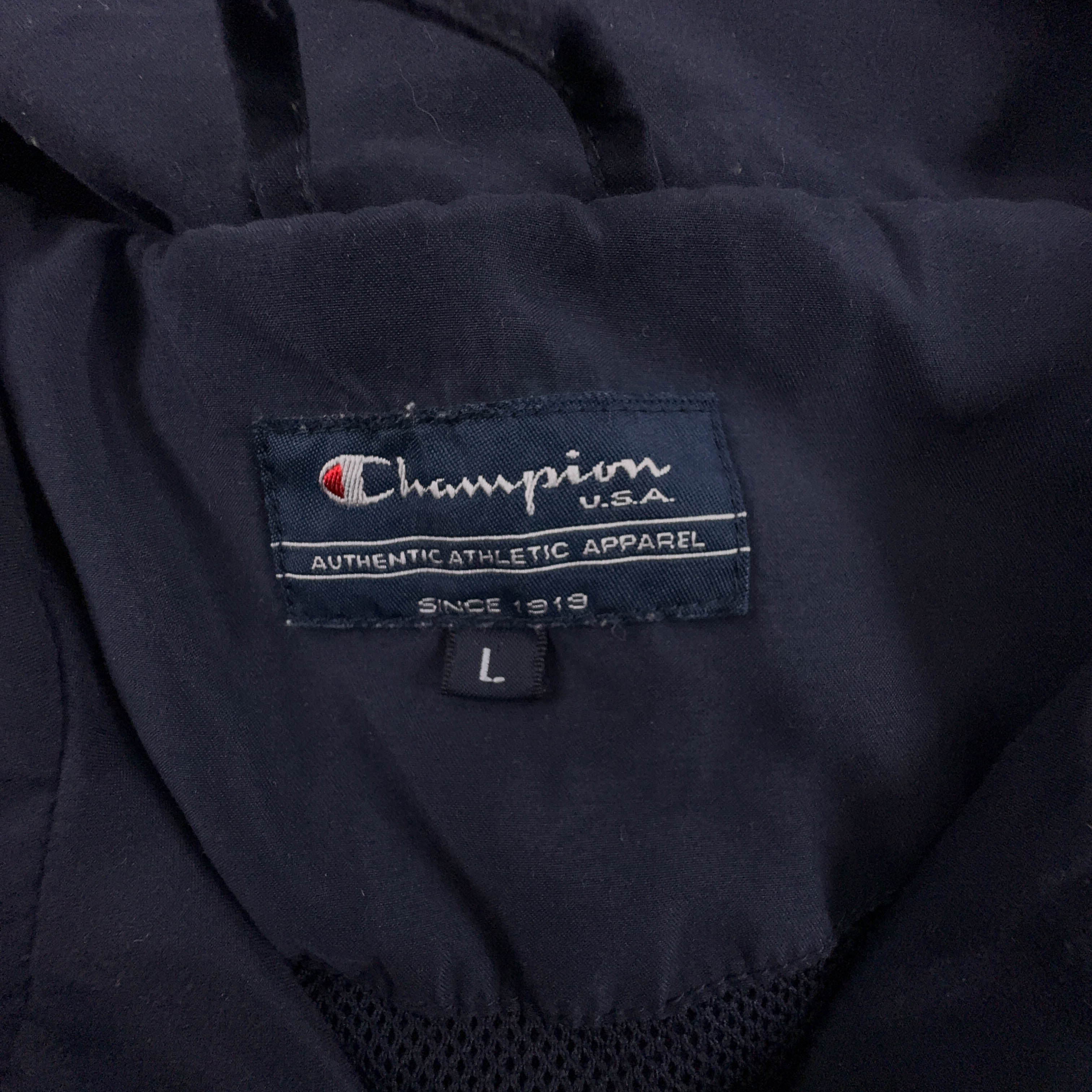Giacca a vento Champion Vintage blu e bianca con zip anni 80 90 - Taglia M/L uomo
