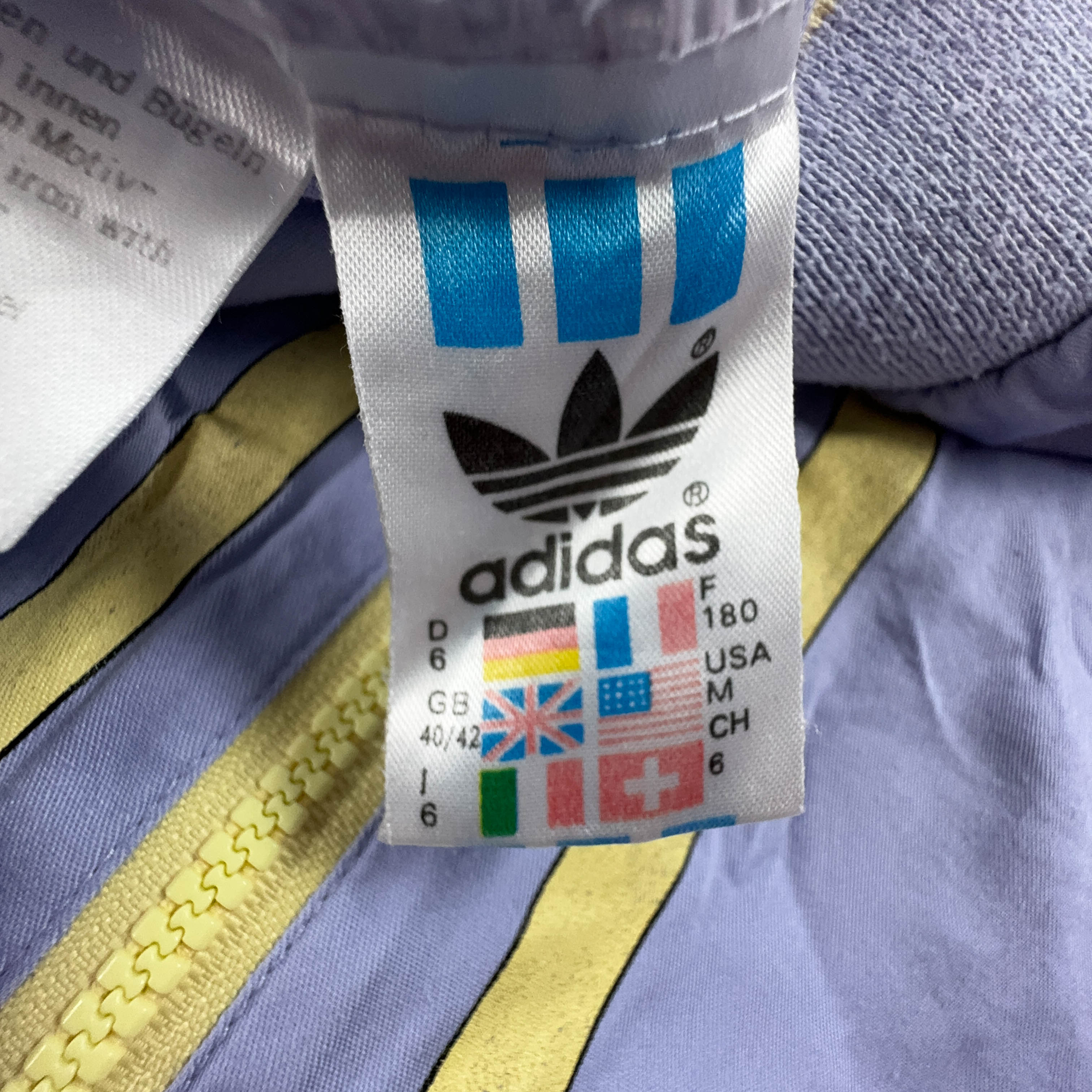 Giacca a vento Adidas Vintage viola e gialla a fantasia geometrica anni 90 - Taglia 180 uomo
