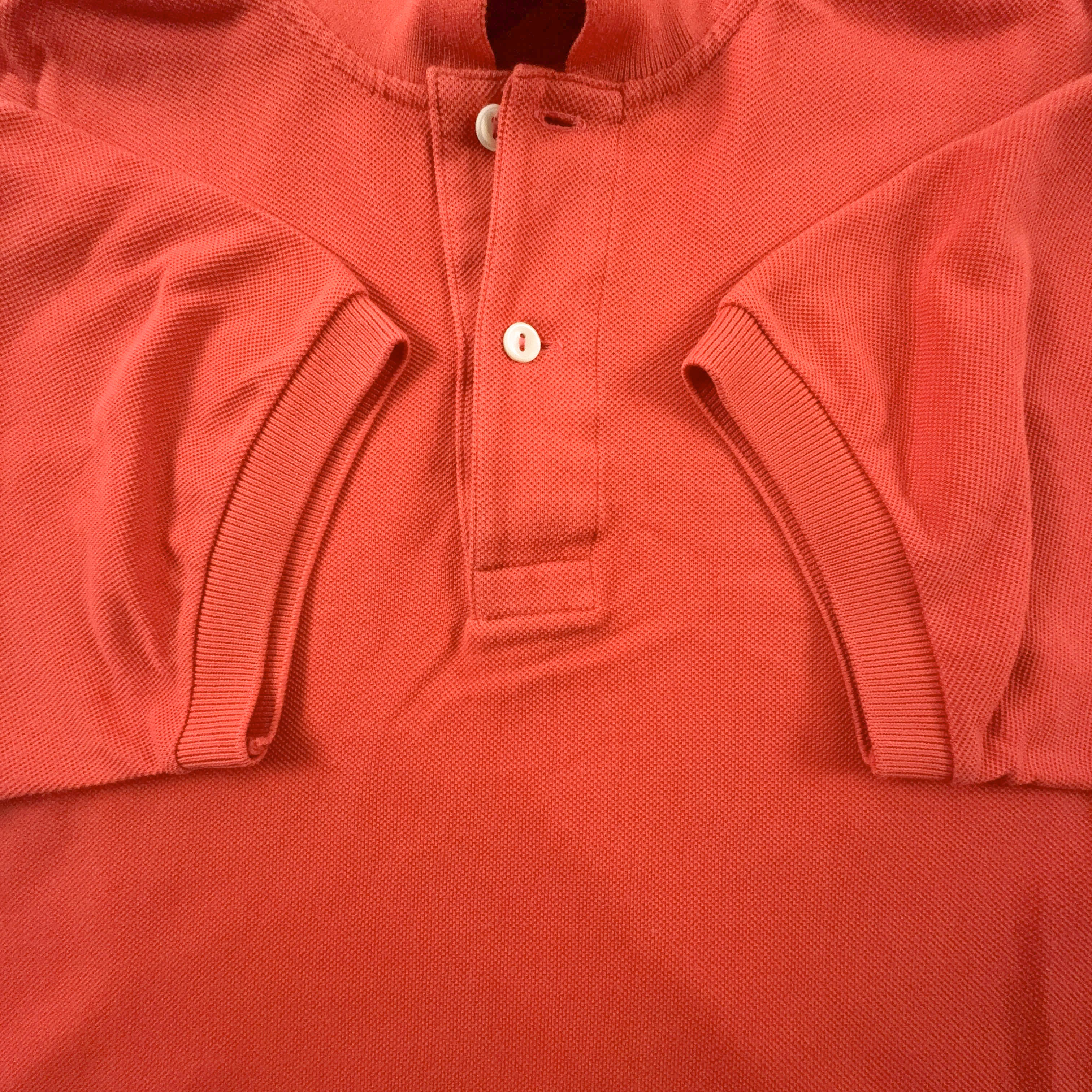 Polo Lacoste arancione a tinta unita - Taglia M/L uomo