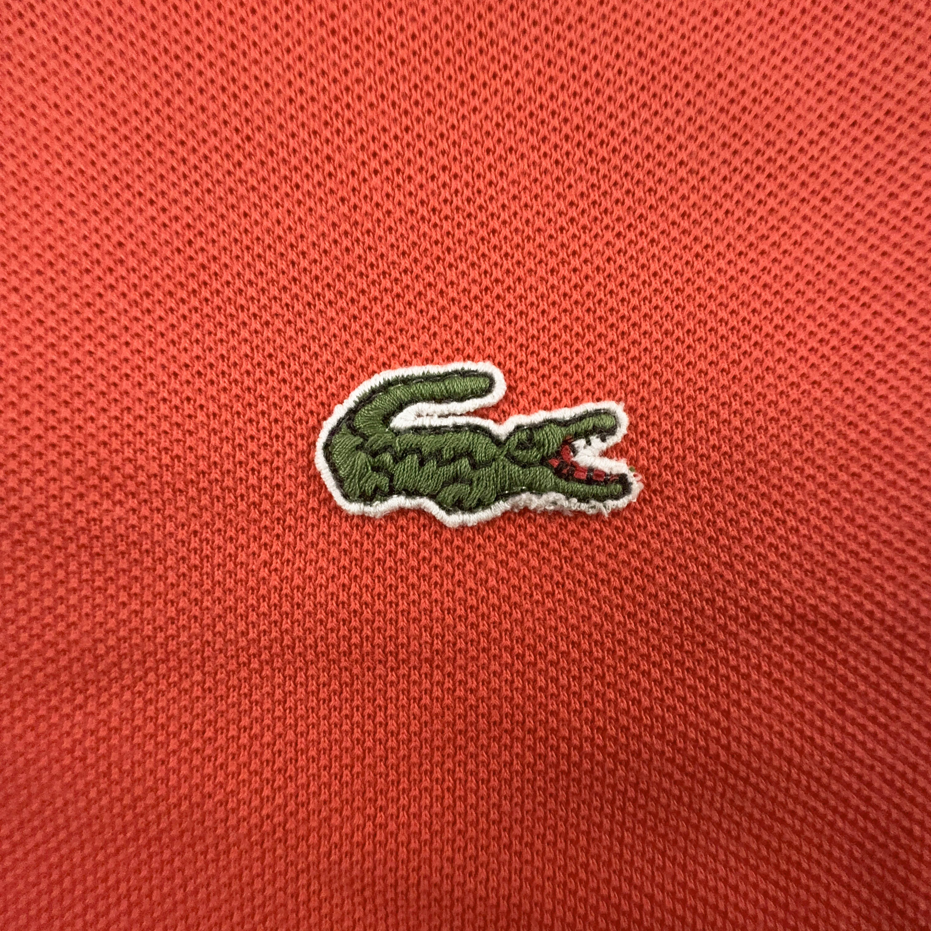 Polo Lacoste arancione a tinta unita - Taglia M/L uomo