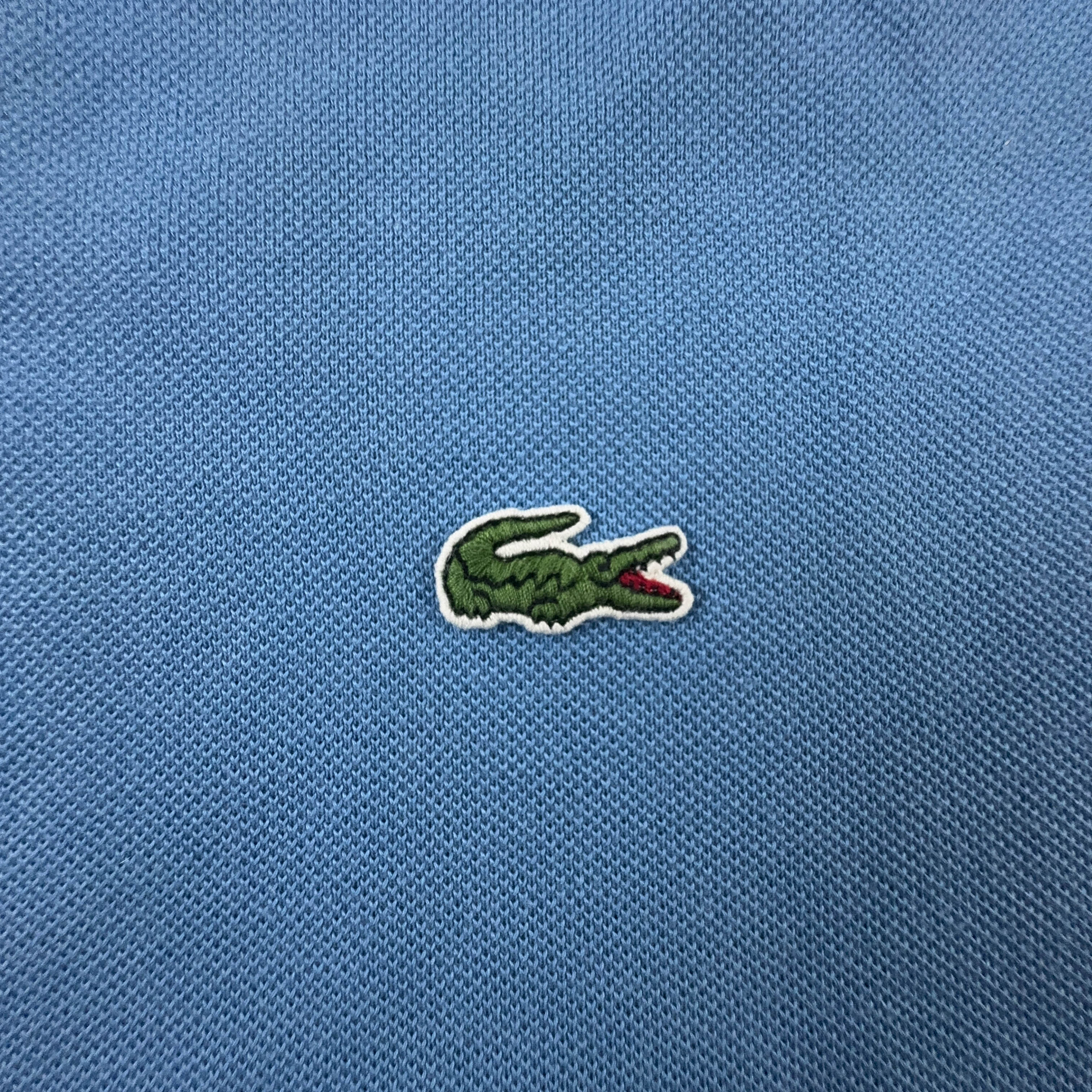 Polo Lacoste azzurra tinta unita in cotone - Taglia 3 uomo