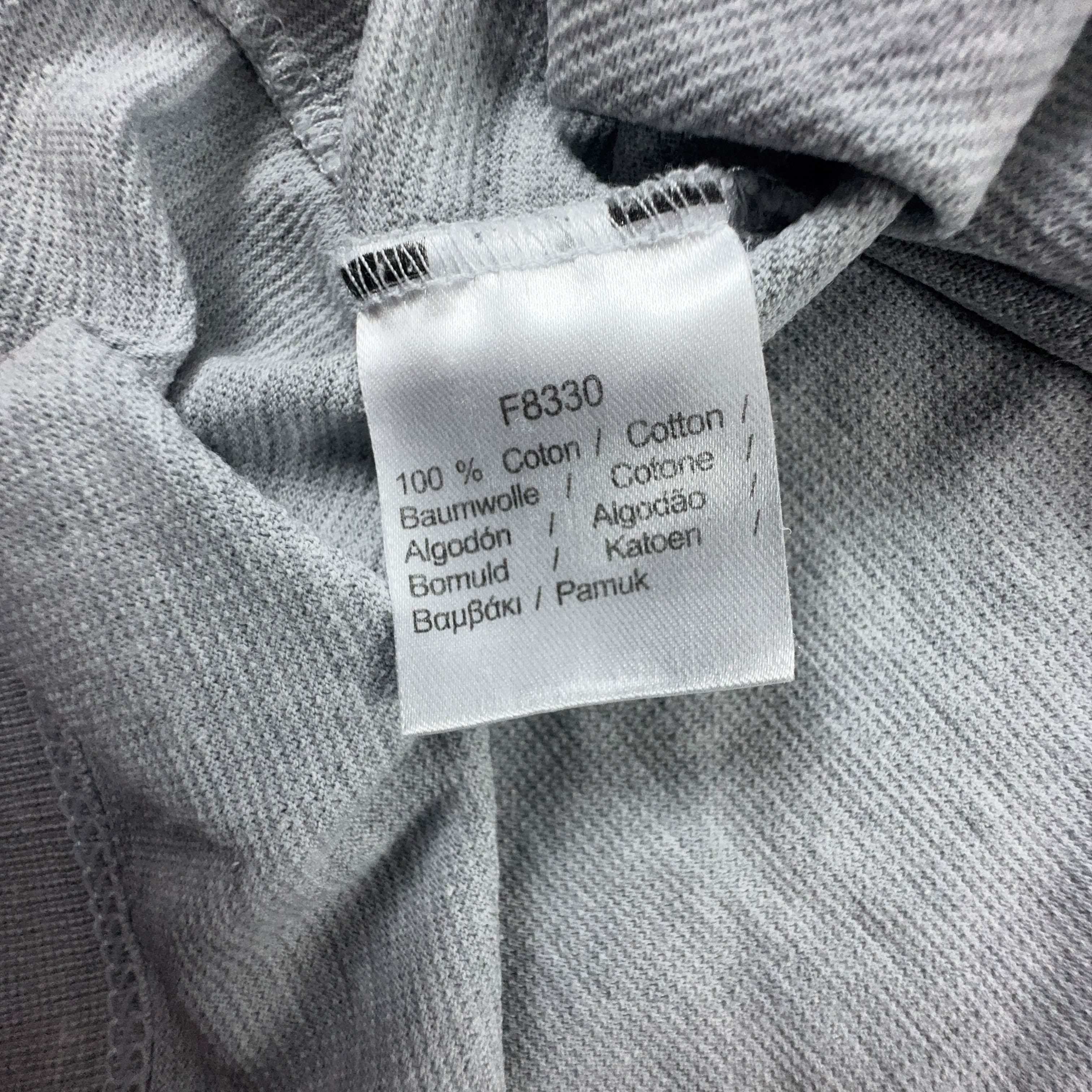 Polo Lacoste grigia tinta unita in cotone - Taglia S uomo