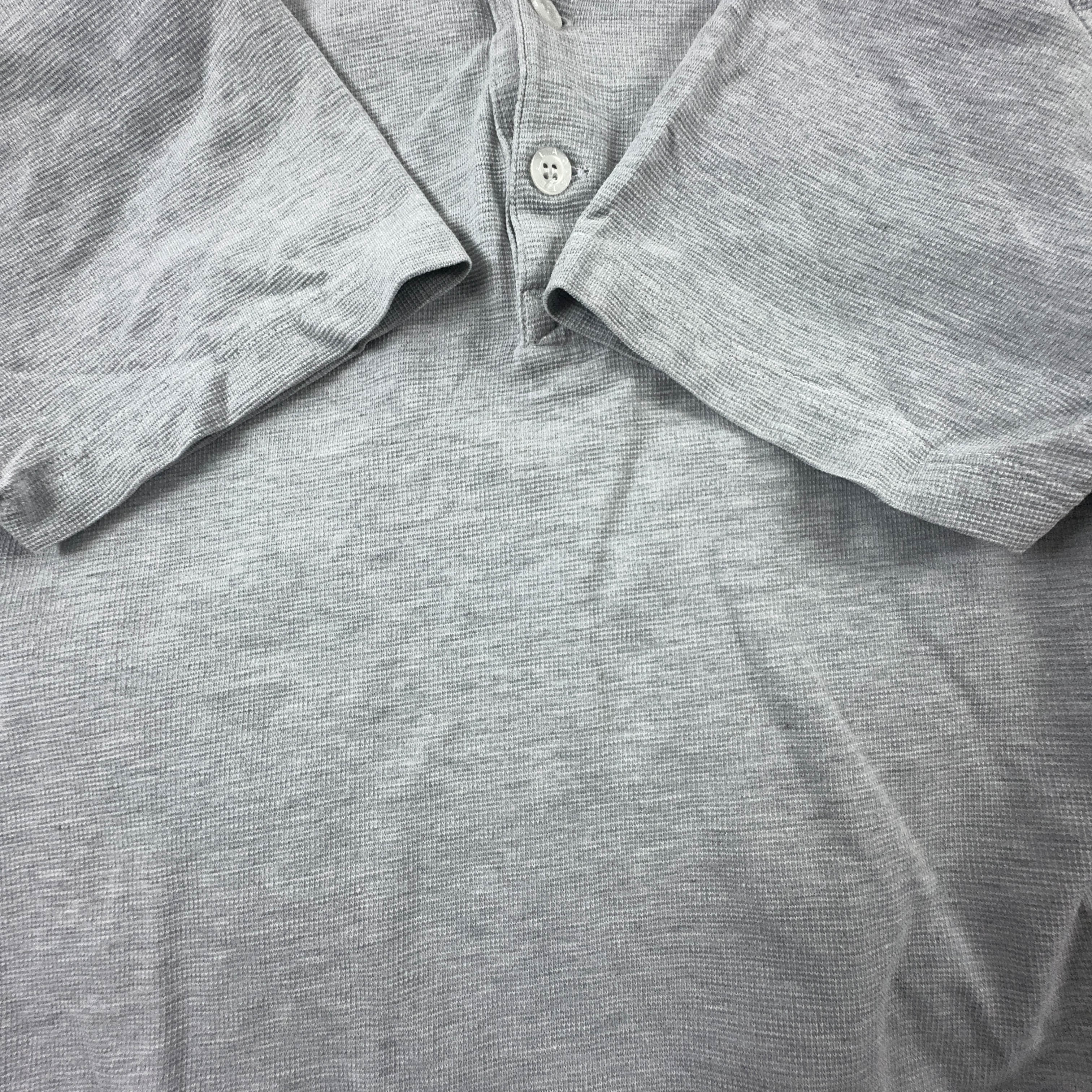 Polo Lacoste grigia tinta unita in cotone - Taglia S uomo