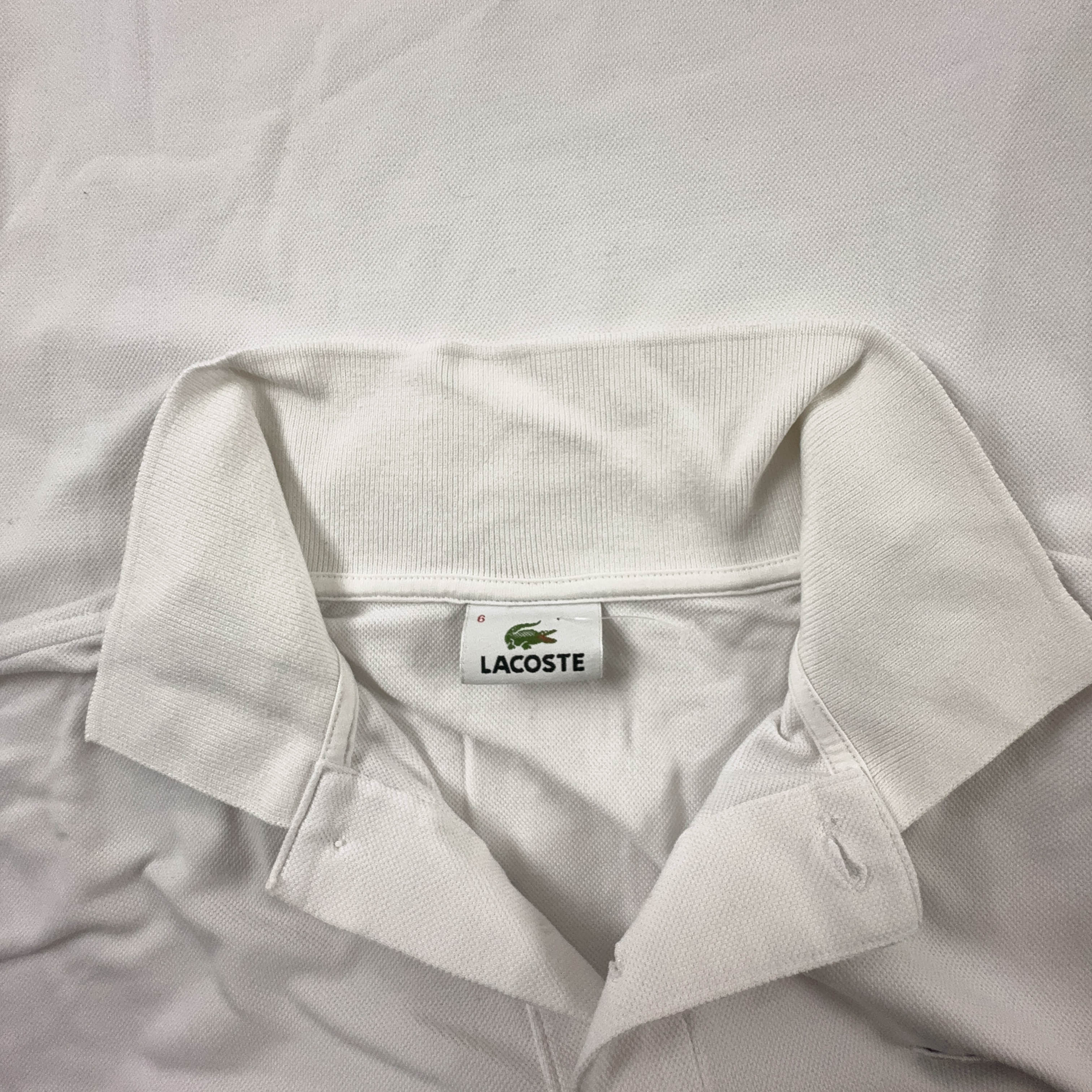 Polo Lacoste bianca tinta unita - Taglia 6 uomo