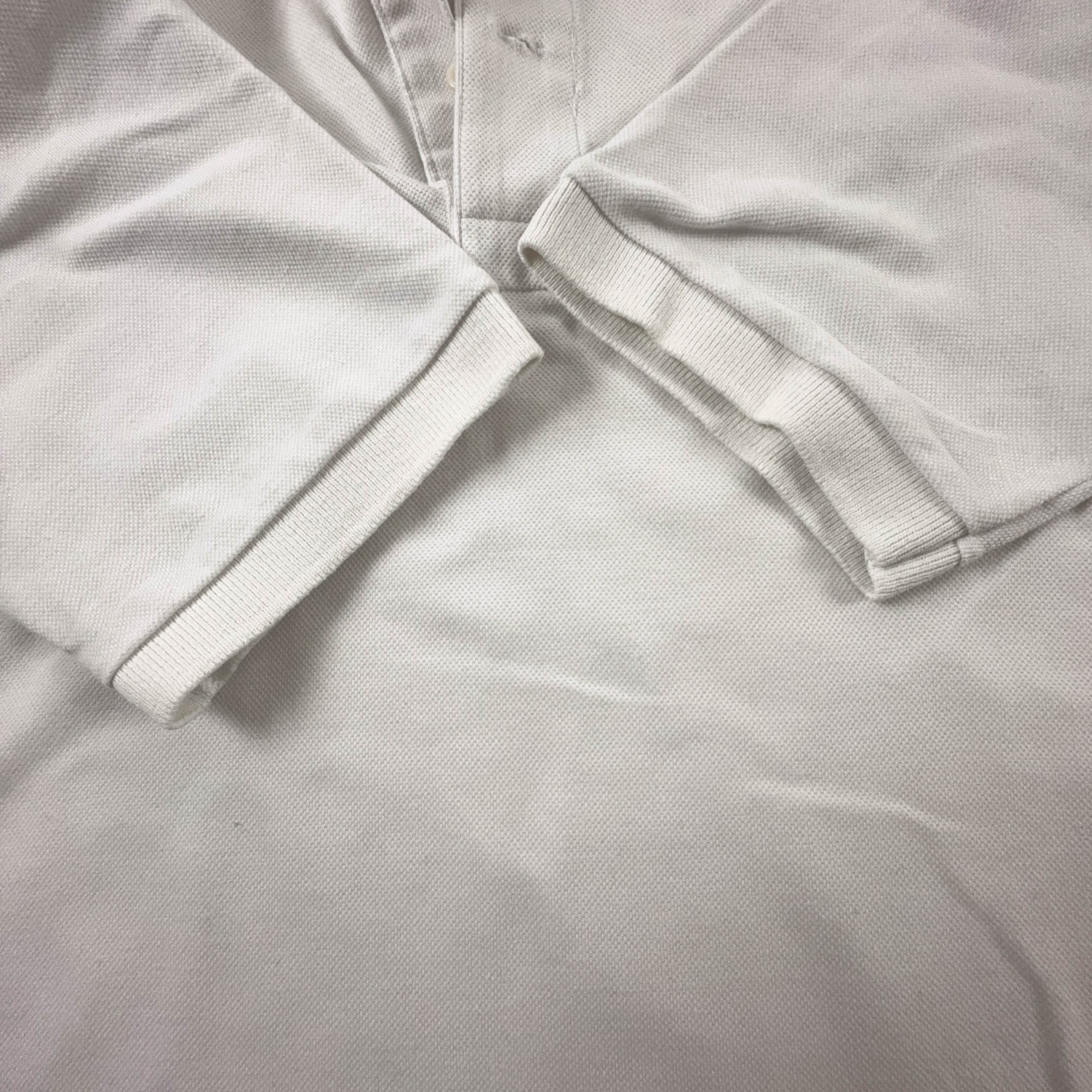 Polo Lacoste bianca tinta unita - Taglia 6 uomo