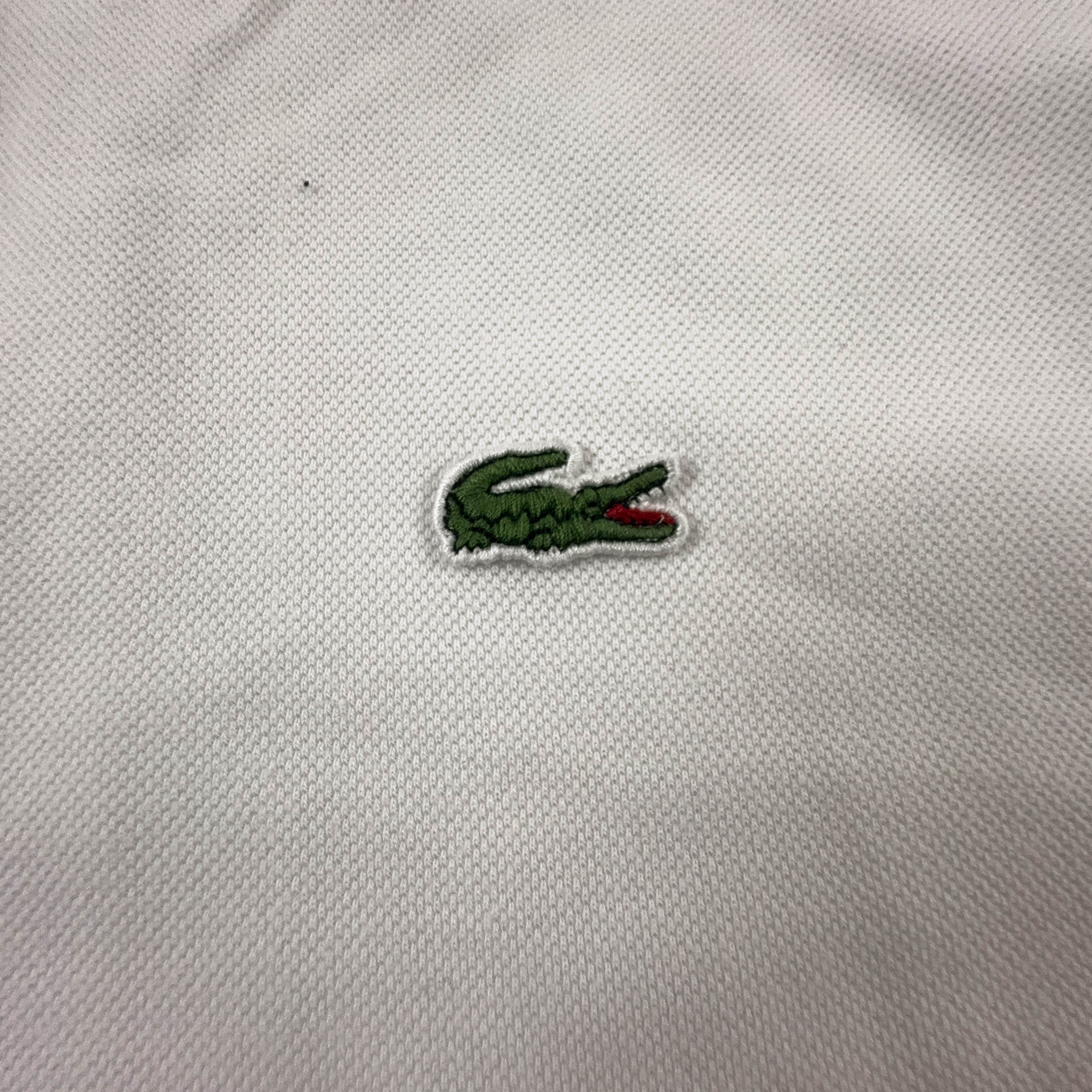 Polo Lacoste bianca tinta unita - Taglia 6 uomo