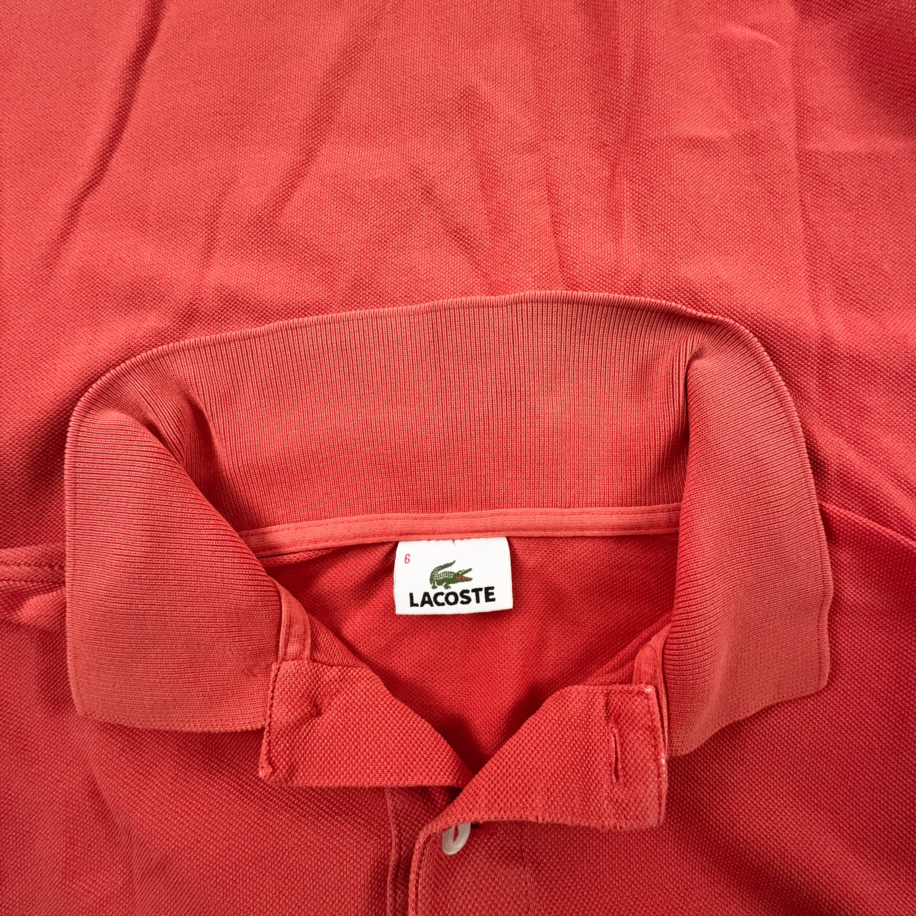 Polo Lacoste arancione a tinta unita - Taglia 6 uomo