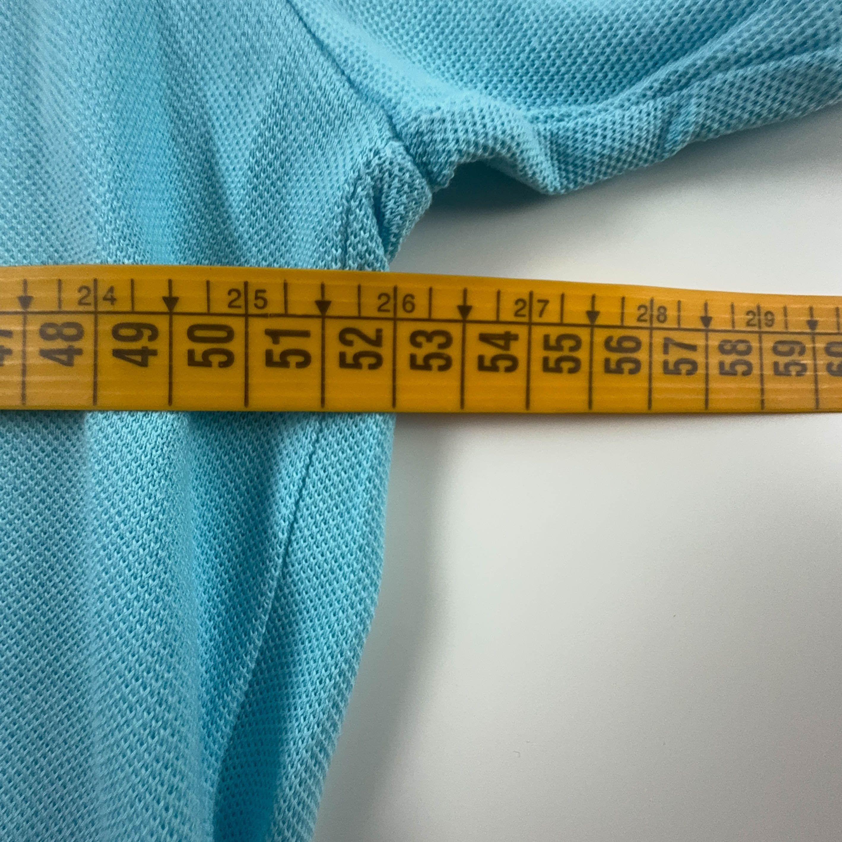 Polo Lacoste azzurra a tinta unita - Taglia 4 uomo