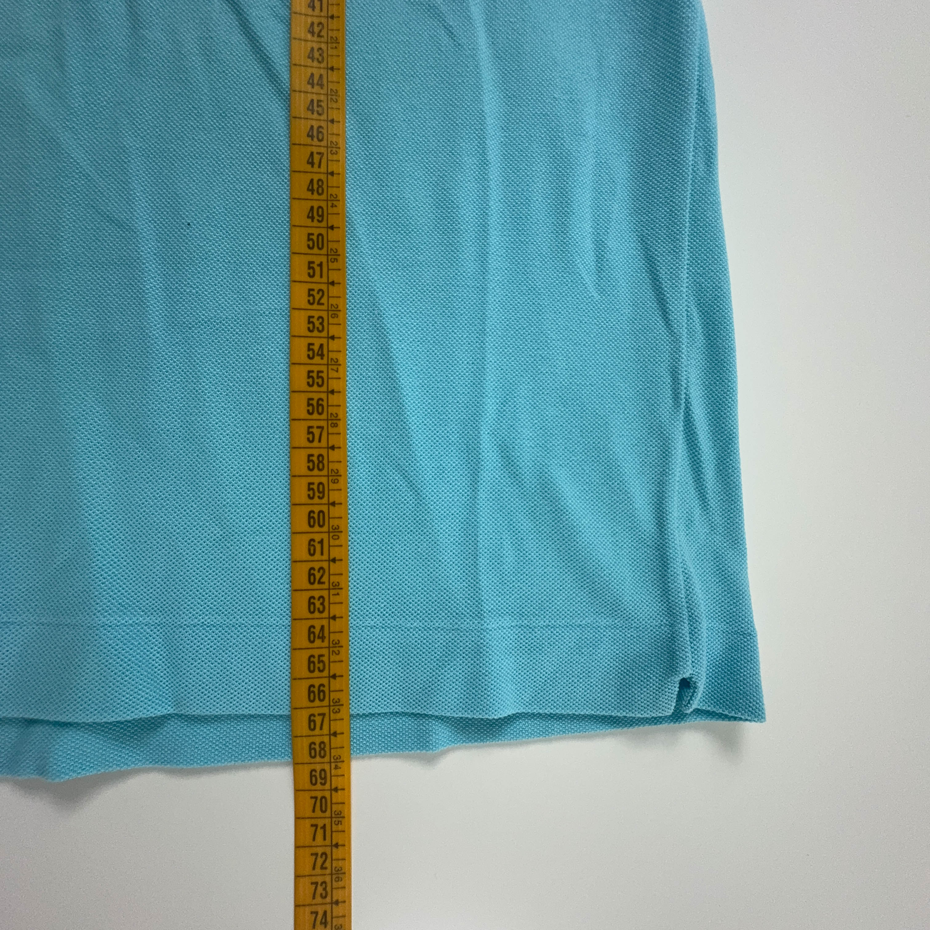 Polo Lacoste azzurra a tinta unita - Taglia 4 uomo