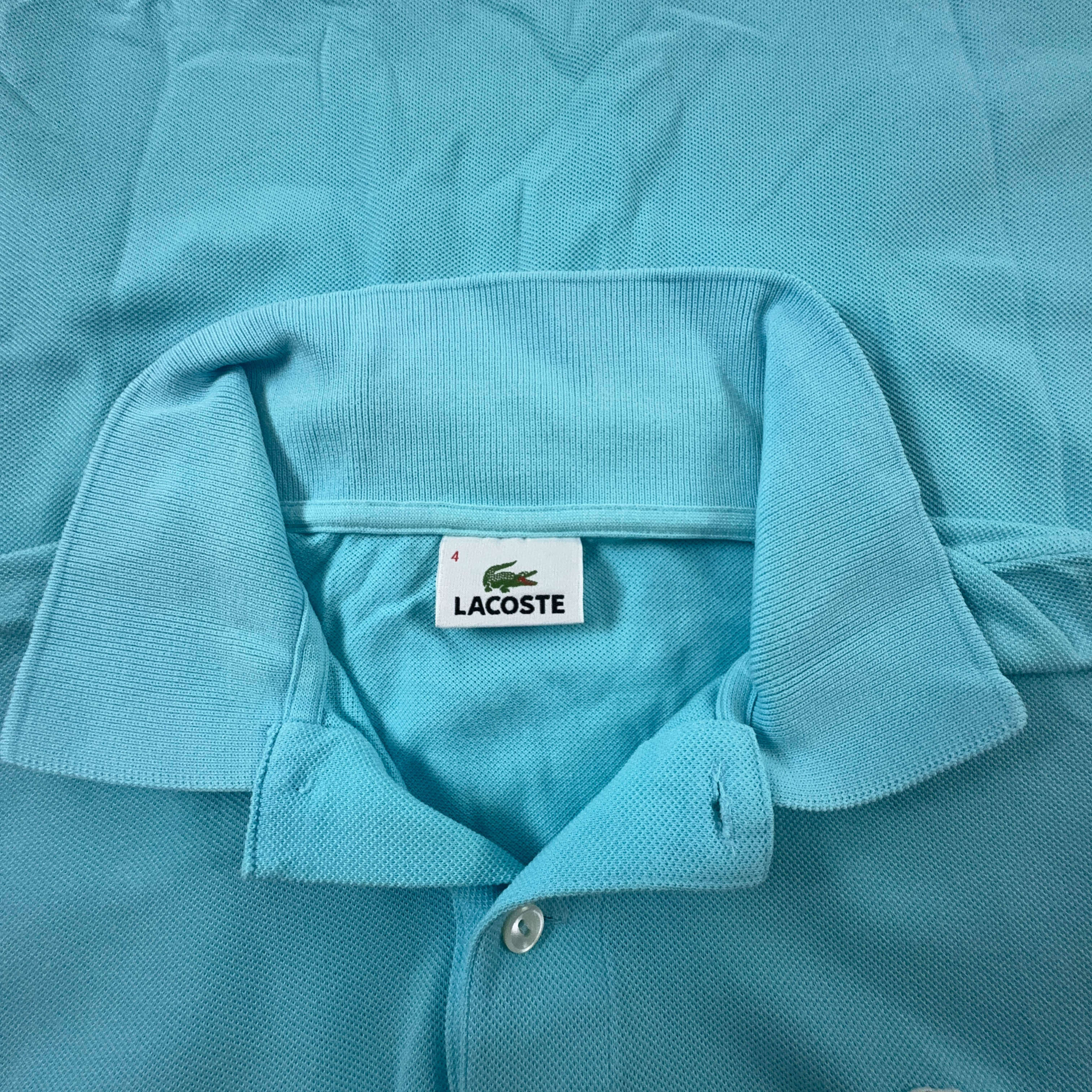 Polo Lacoste azzurra a tinta unita - Taglia 4 uomo