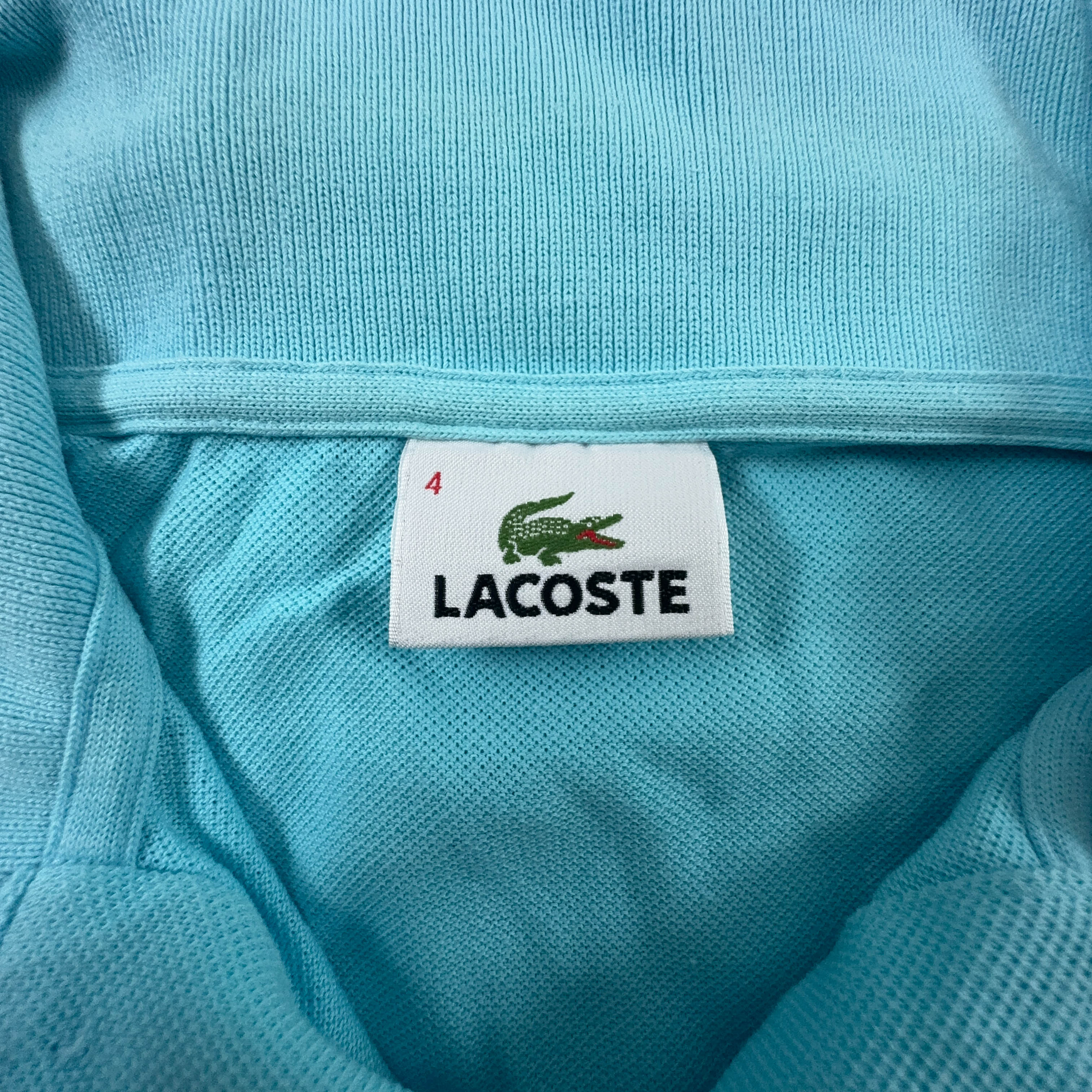 Polo Lacoste azzurra a tinta unita - Taglia 4 uomo