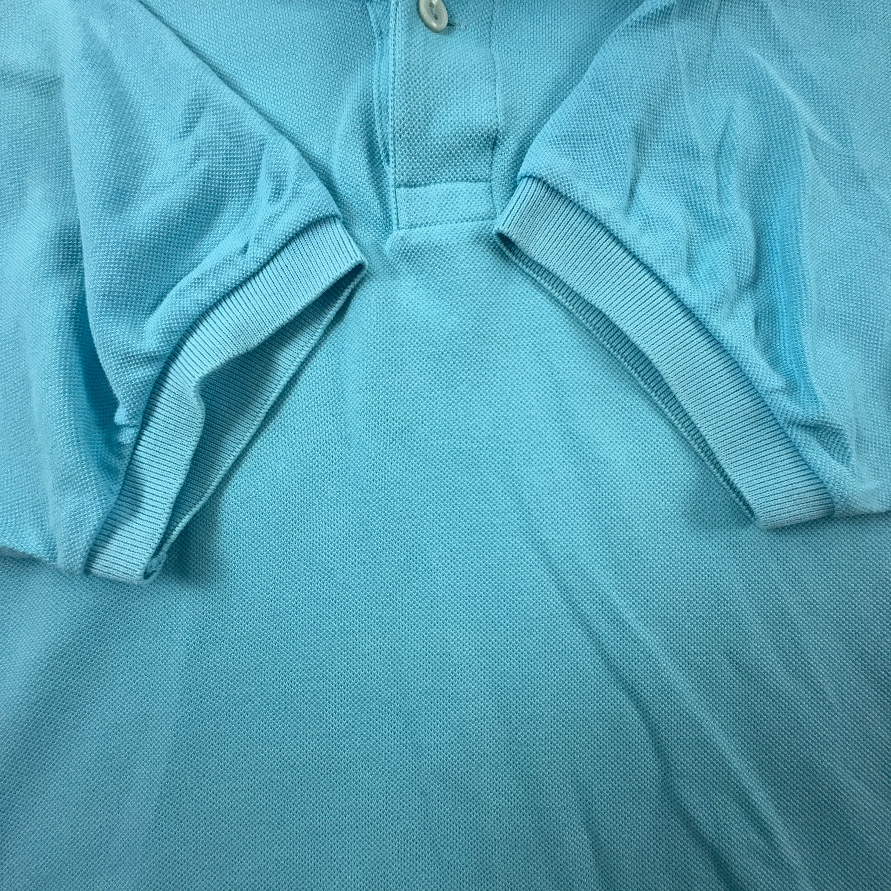 Polo Lacoste azzurra a tinta unita - Taglia 4 uomo