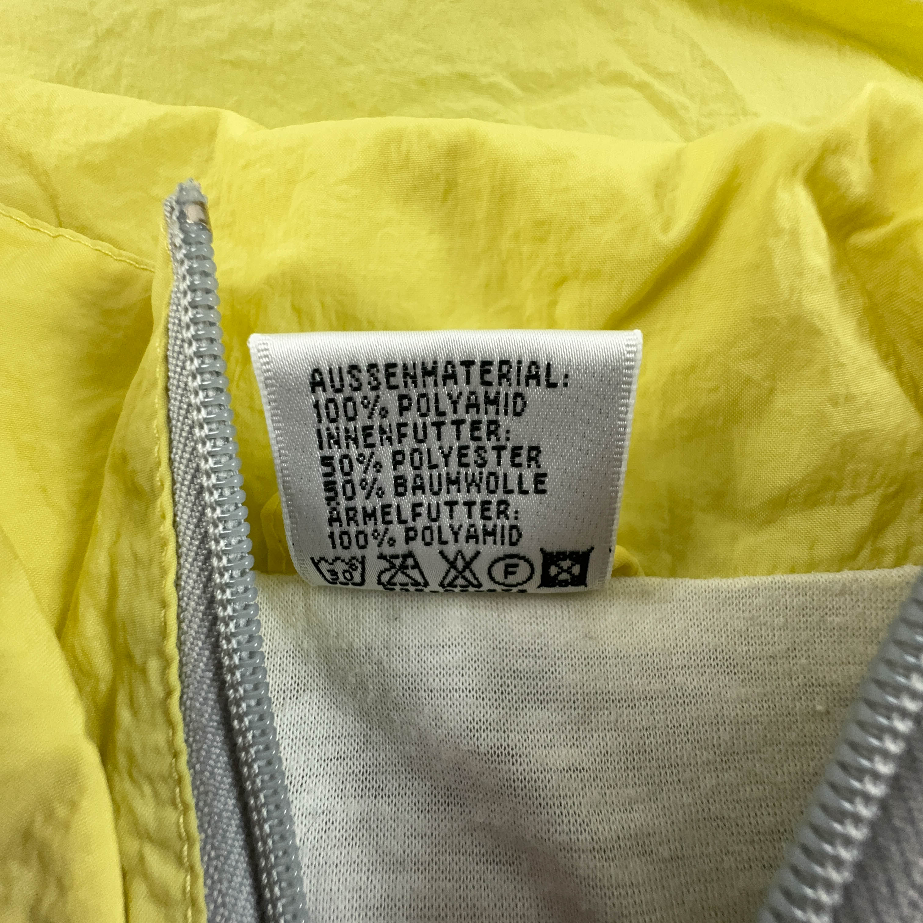 Giacca a vento Puma Vintage grigia e gialla con zip anni 90 - Taglia M/L uomo