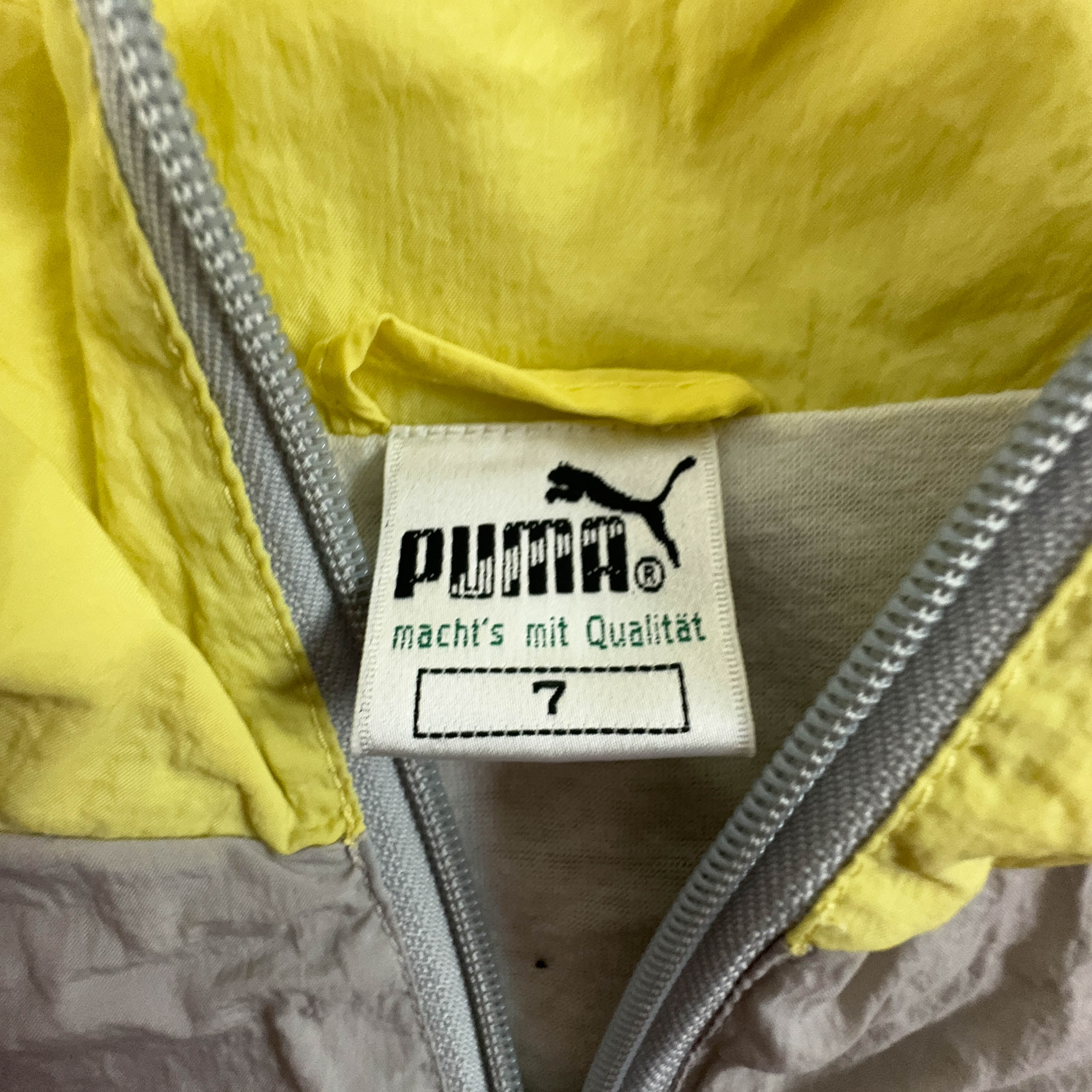 Giacca a vento Puma Vintage grigia e gialla con zip anni 90 - Taglia M/L uomo