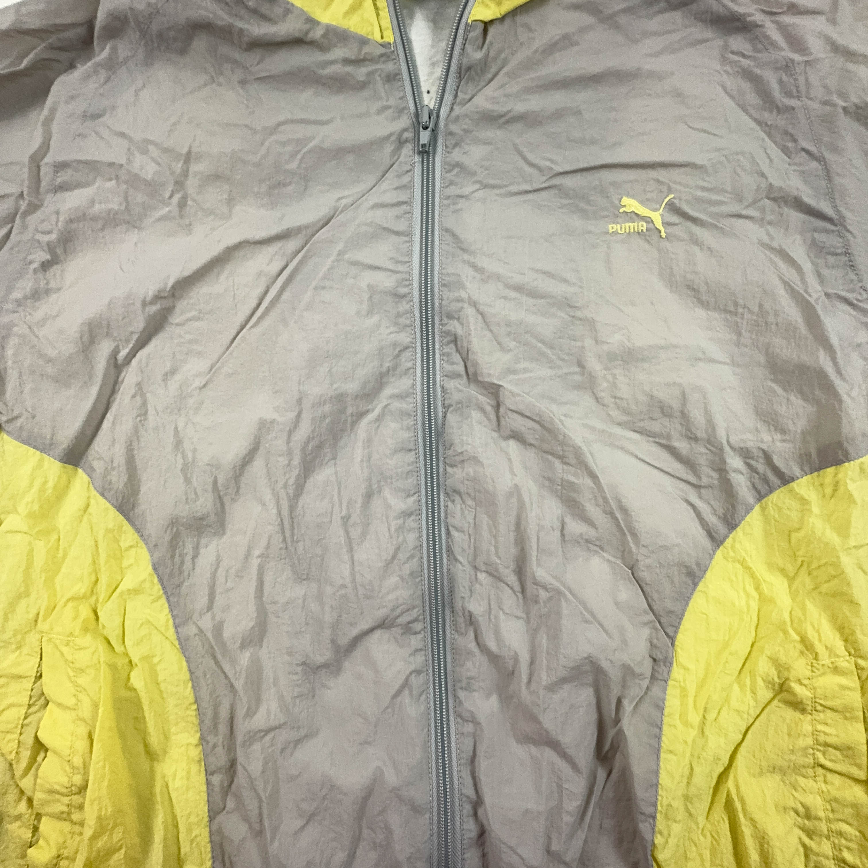 Giacca a vento Puma Vintage grigia e gialla con zip anni 90 - Taglia M/L uomo