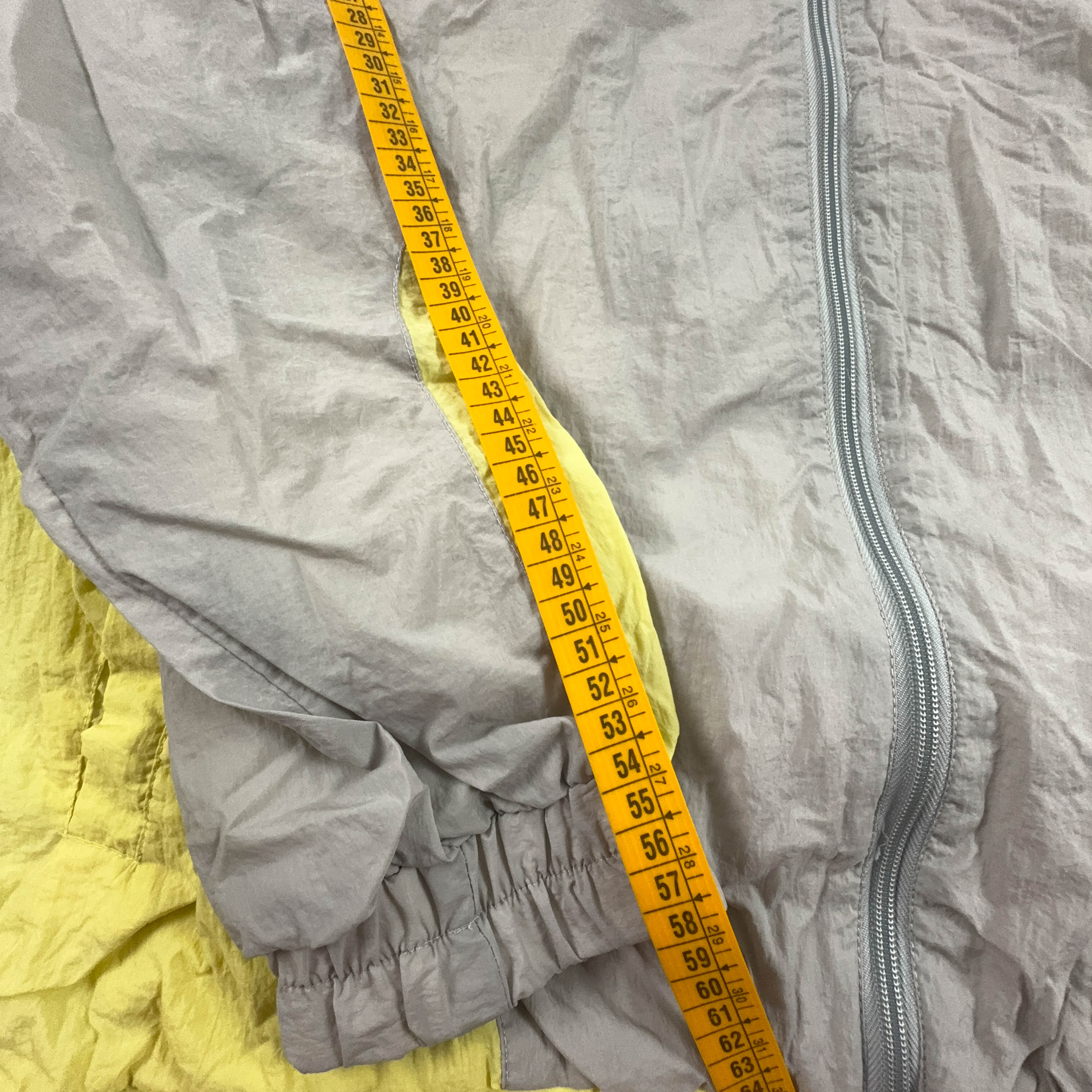 Giacca a vento Puma Vintage grigia e gialla con zip anni 90 - Taglia M/L uomo