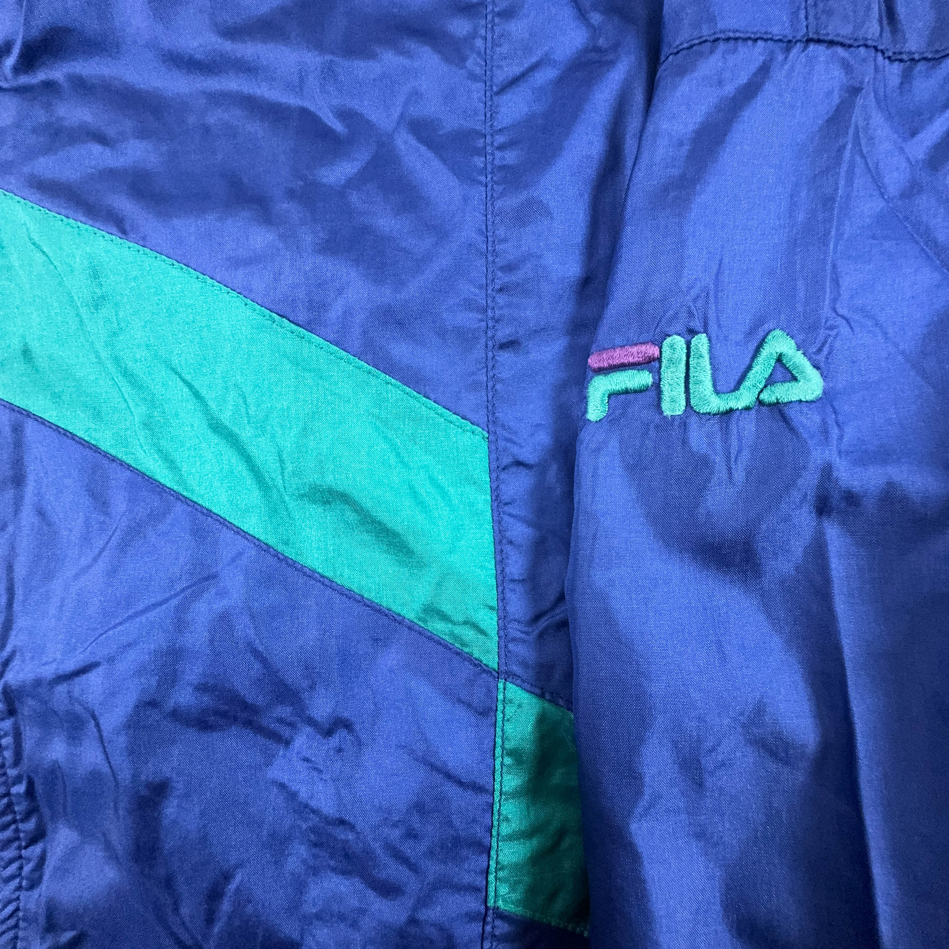 Giacca a vento Fila Vintage blu e verde geometrica con zip anni 90 - Taglia I52 uomo