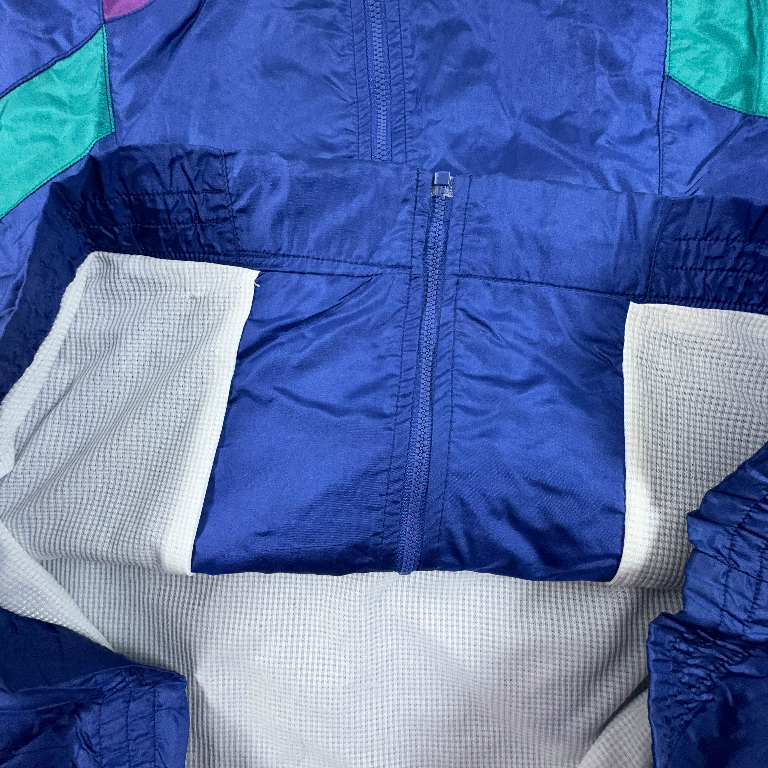 Giacca a vento Fila Vintage blu e verde geometrica con zip anni 90 - Taglia I52 uomo