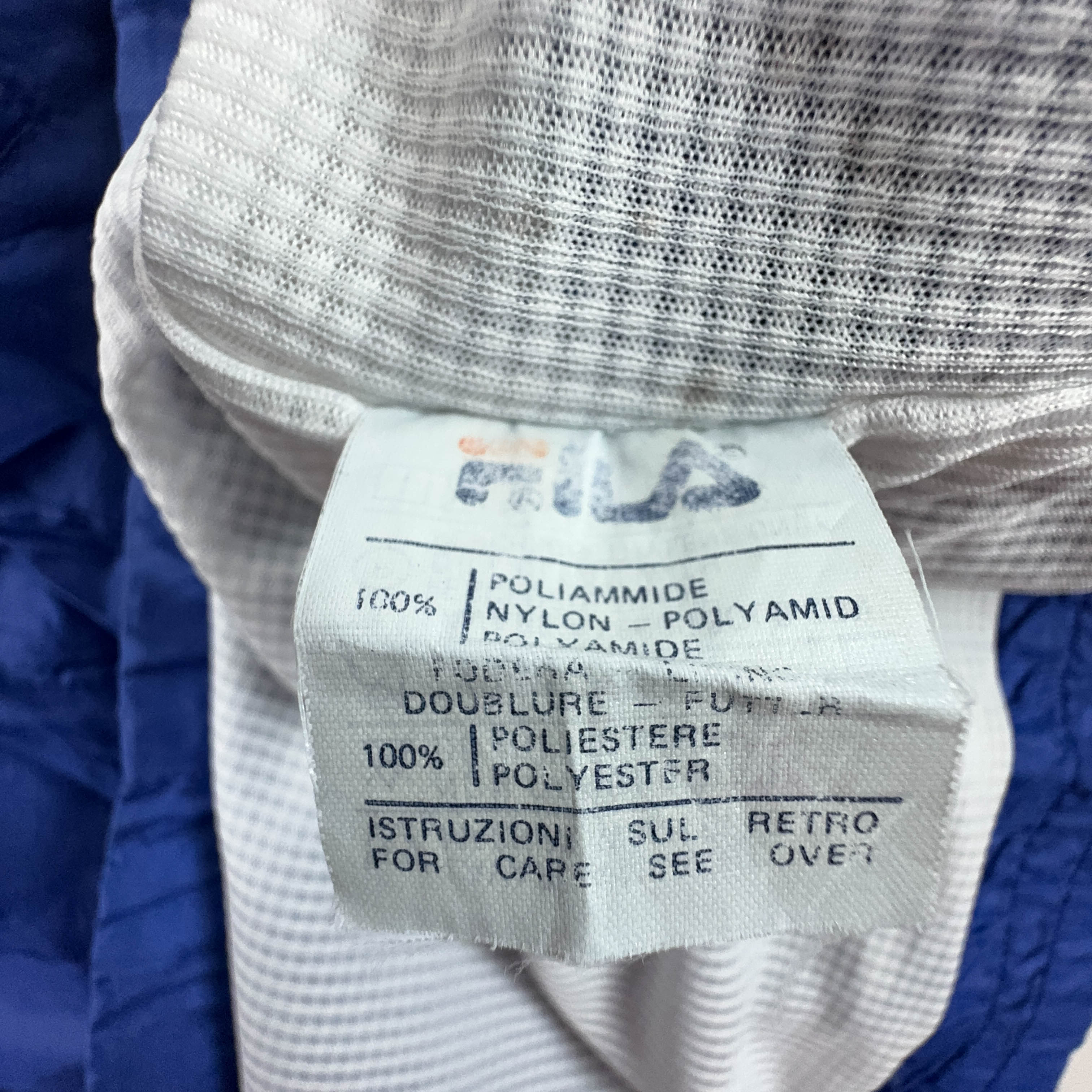 Giacca a vento Fila Vintage blu e verde geometrica con zip anni 90 - Taglia I52 uomo