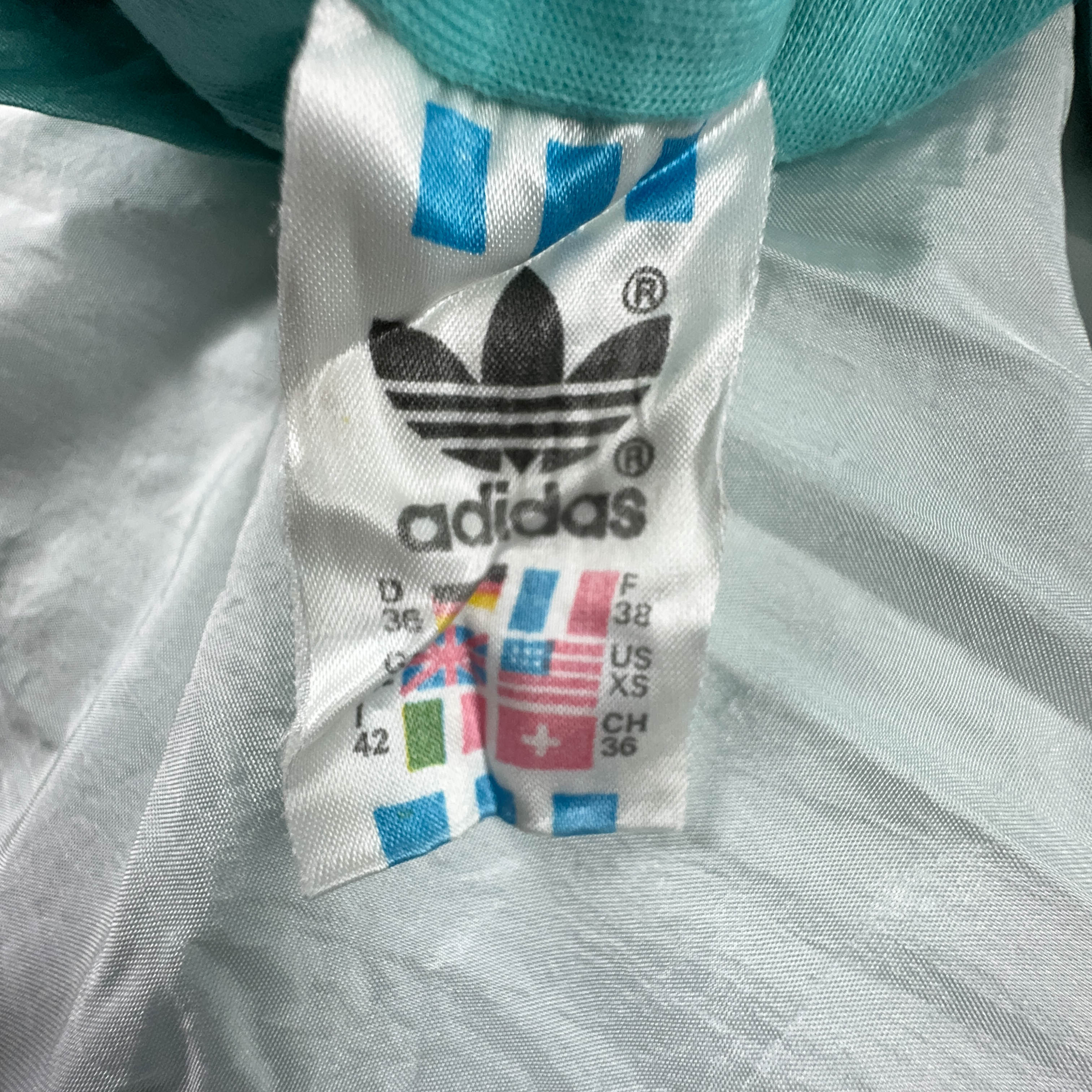 Giacca a vento Adidas Vintage verde e bianca con zip anni 90 - Taglia M uomo