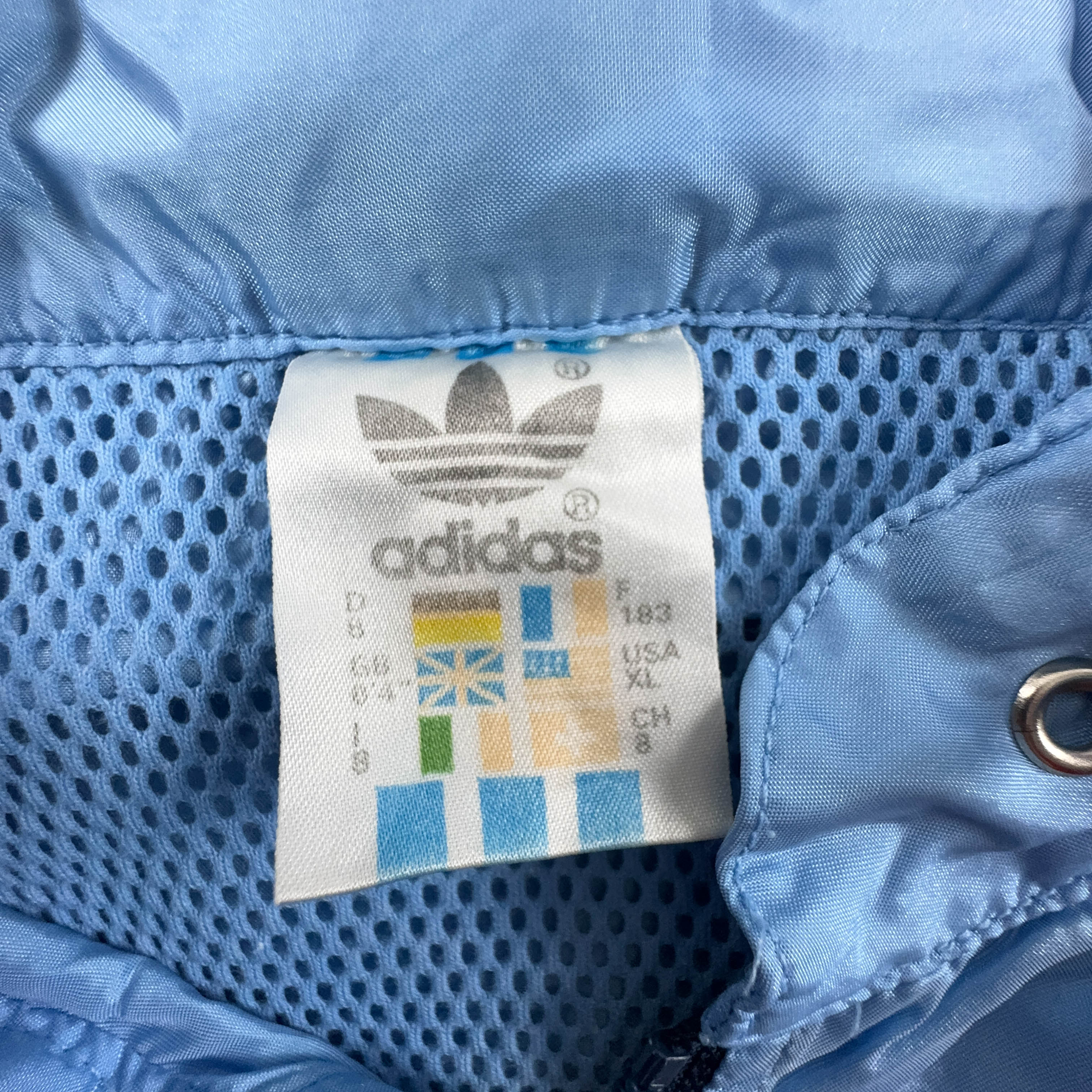 Giacca a vento Adidas Vintage rossa e blu con zip e cappuccio anni 80 - Taglia D8 F183 uomo