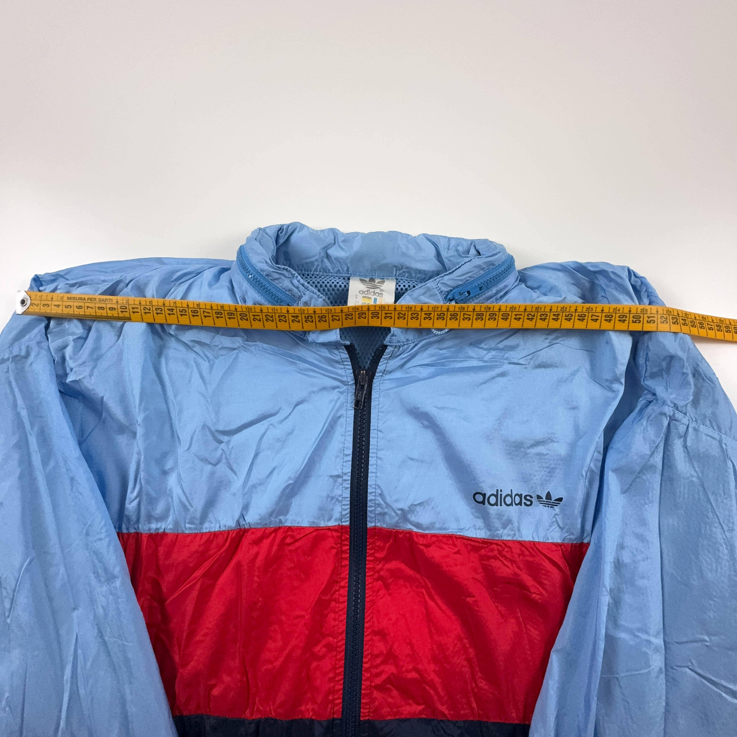 Giacca a vento Adidas Vintage rossa e blu con zip e cappuccio anni 80 - Taglia D8 F183 uomo