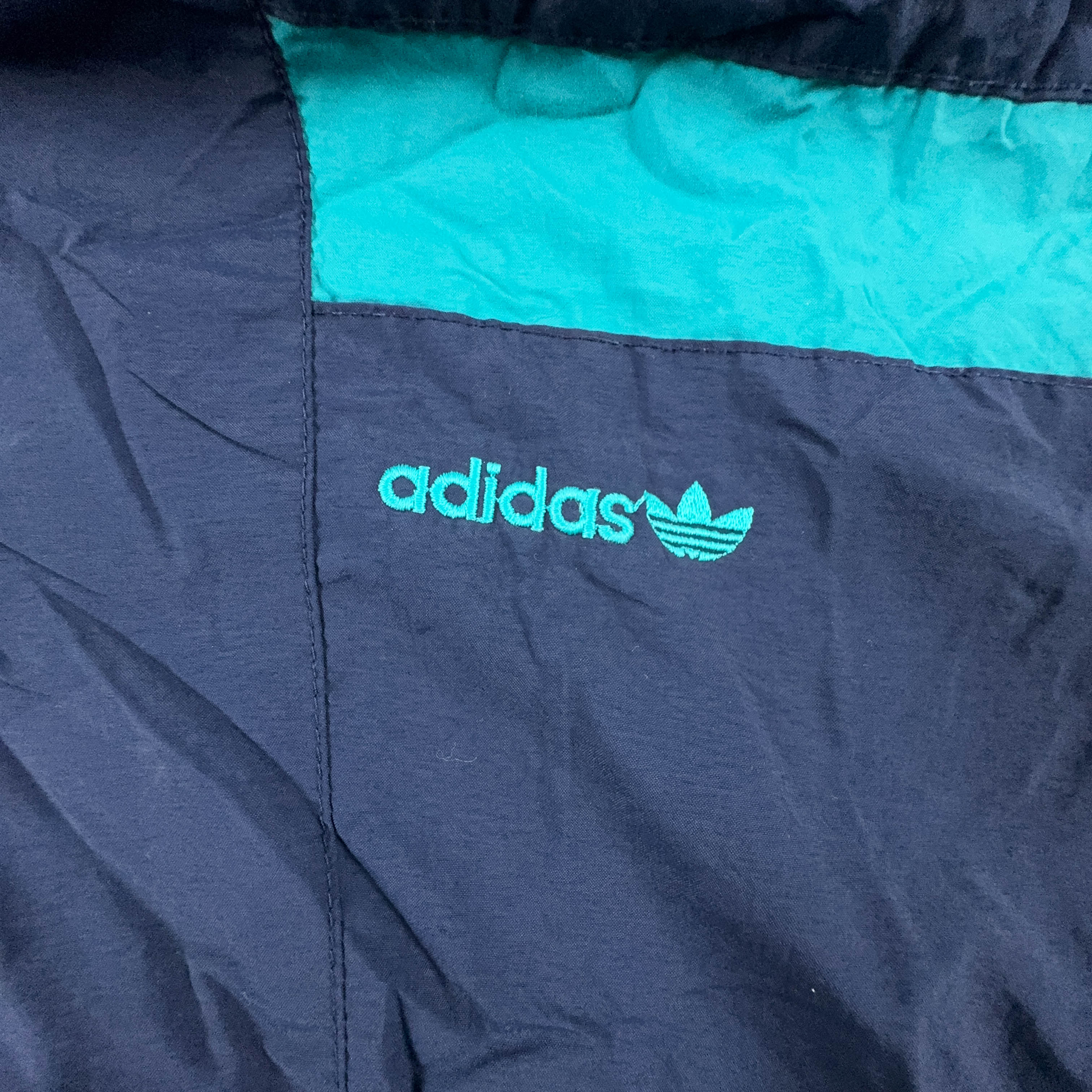Giacca a vento Adidas Vintage blu scuro con zip e cappuccio anni 90 - Taglia 48 uomo