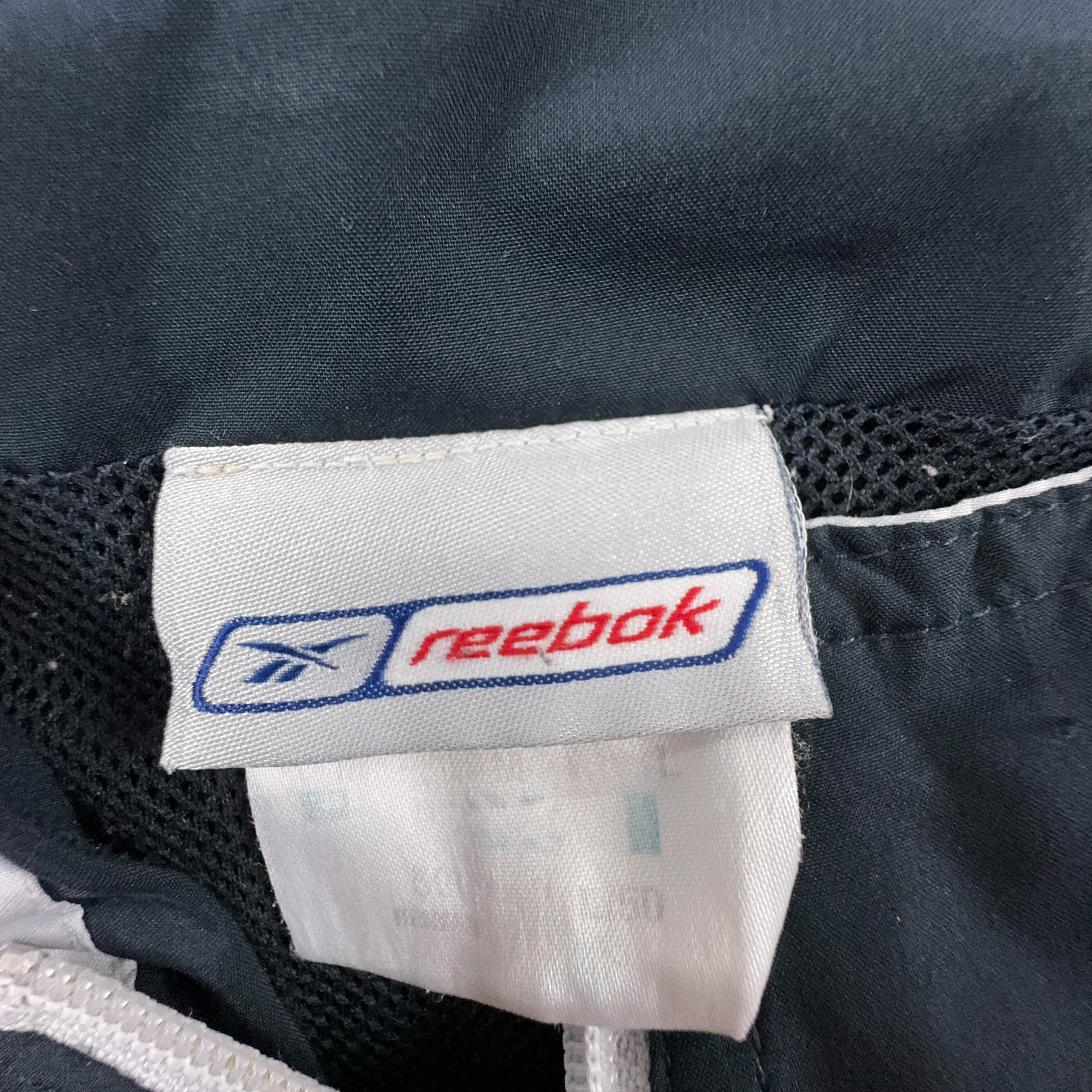 Giacca a vento Reebok Vintage grigia e blu con zip anni 2000 - Taglia XL uomo