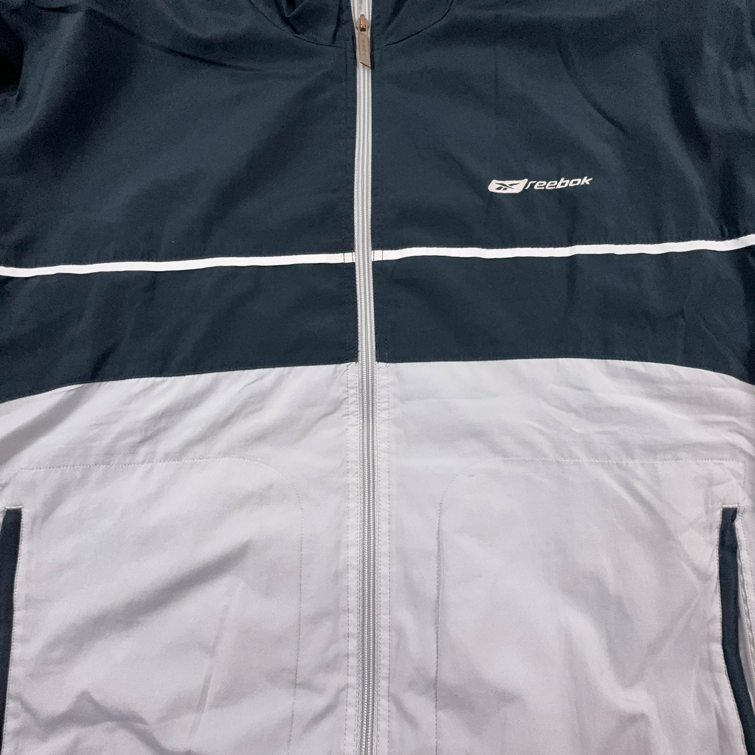 Giacca a vento Reebok Vintage grigia e blu con zip anni 2000 - Taglia XL uomo