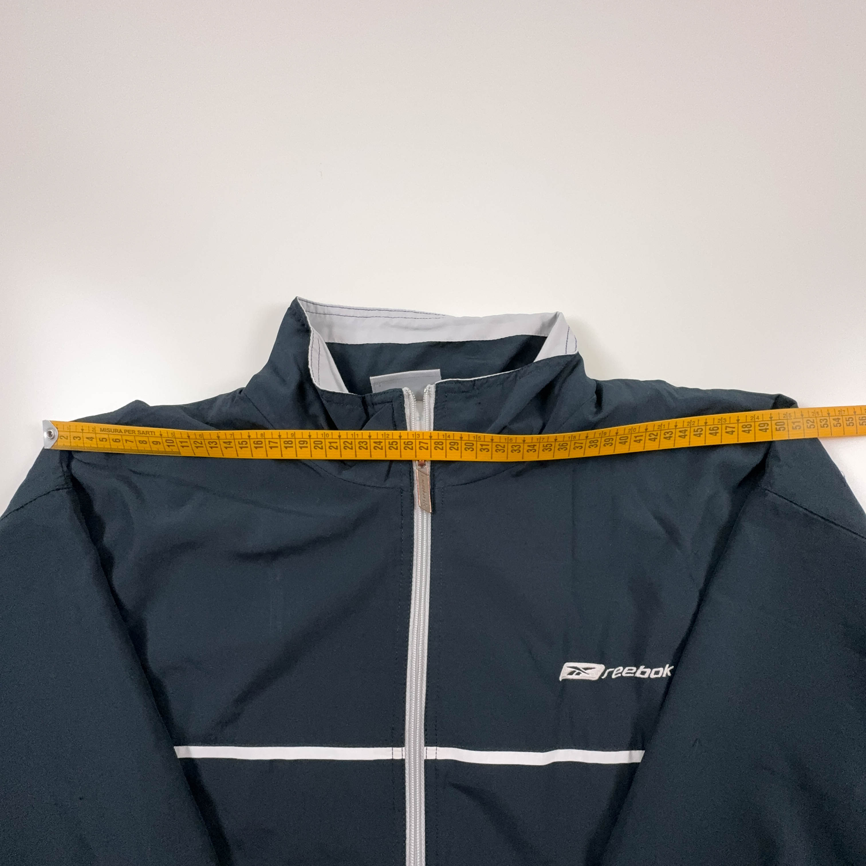 Giacca a vento Reebok Vintage grigia e blu con zip anni 2000 - Taglia XL uomo