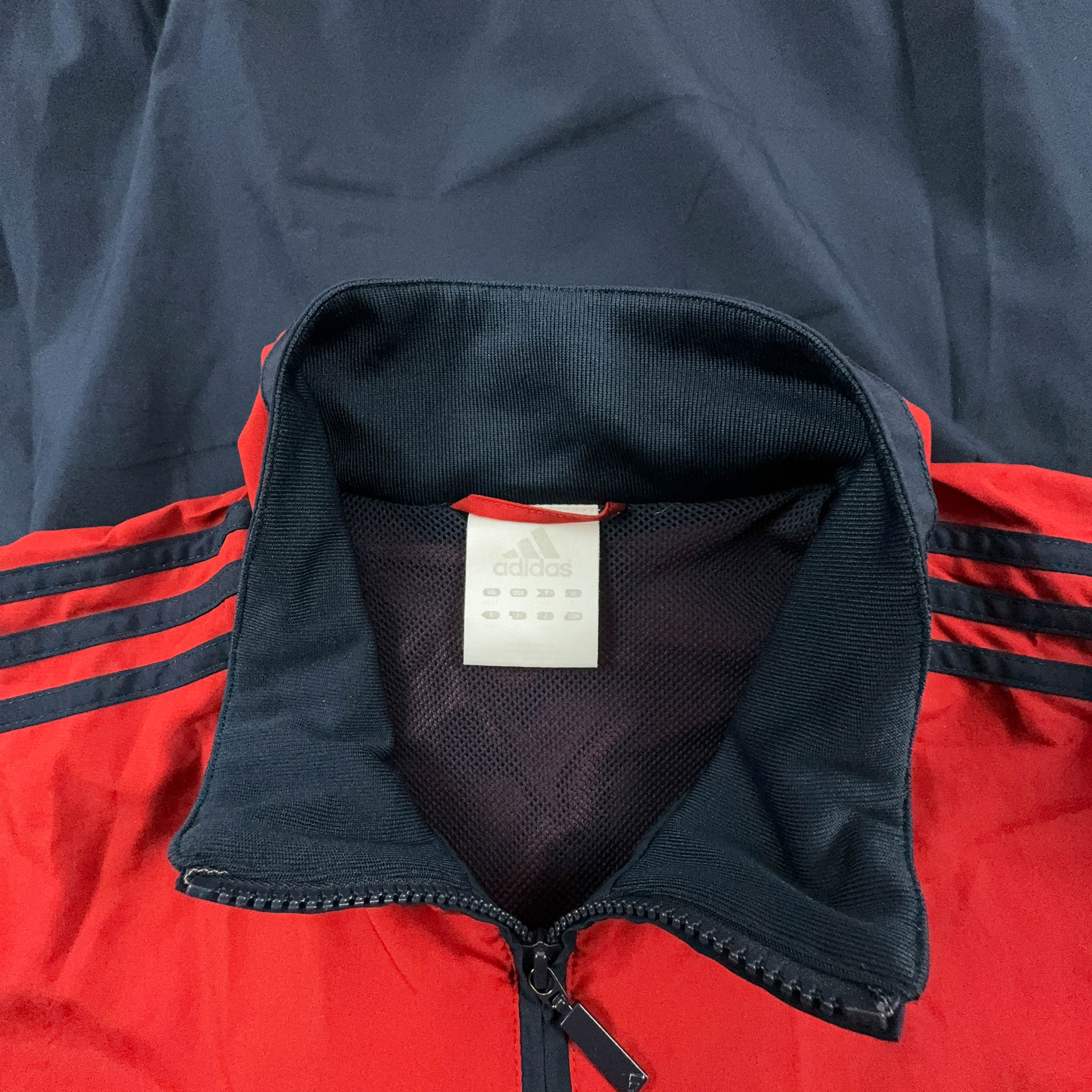 Giacca a vento Adidas Vintage blu e rossa anni 2000 con zip - Taglia L/XL uomo