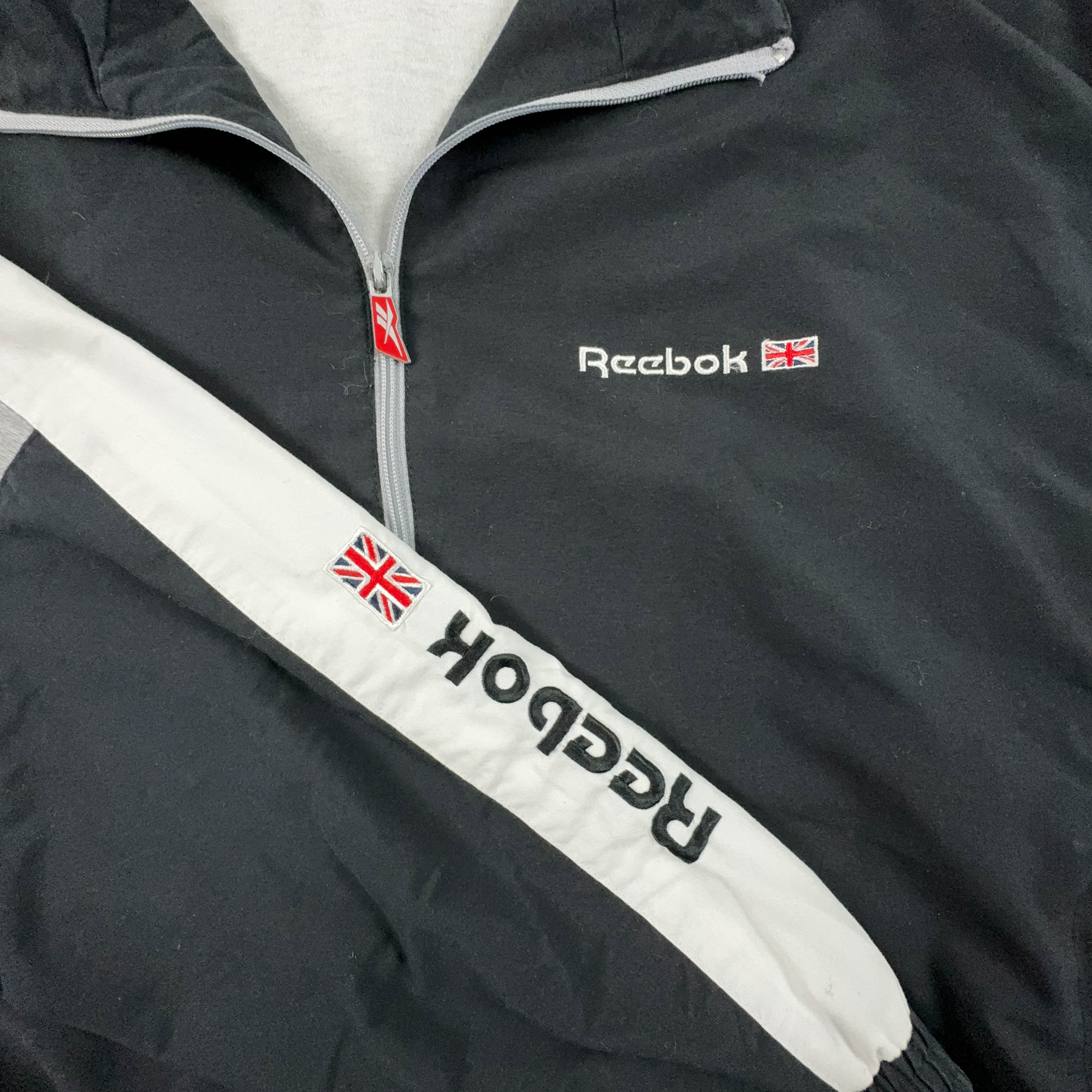 Giacca a vento Reebok Vintage nera e grigia con zip anni 90 - Taglia M uomo