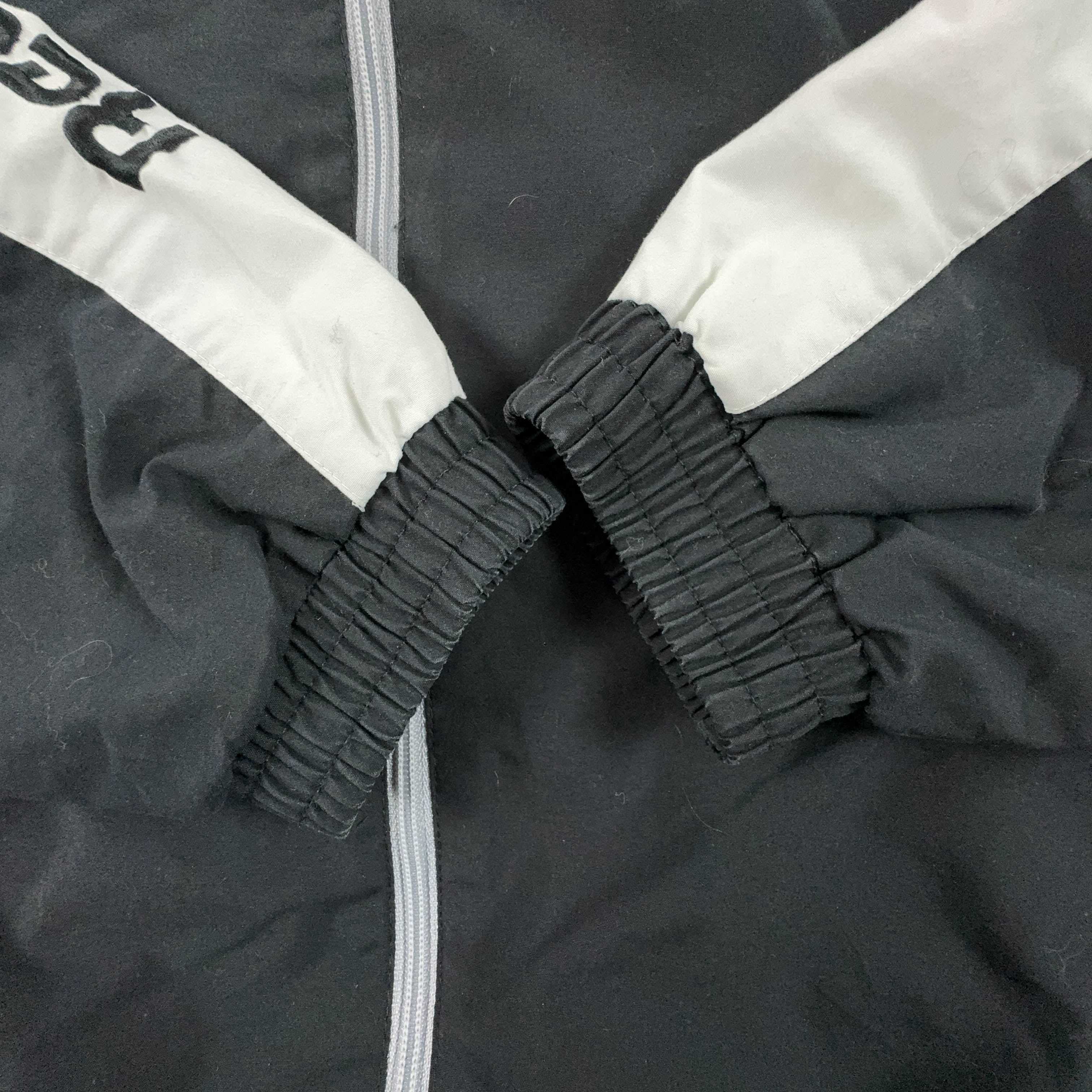 Giacca a vento Reebok Vintage nera e grigia con zip anni 90 - Taglia M uomo