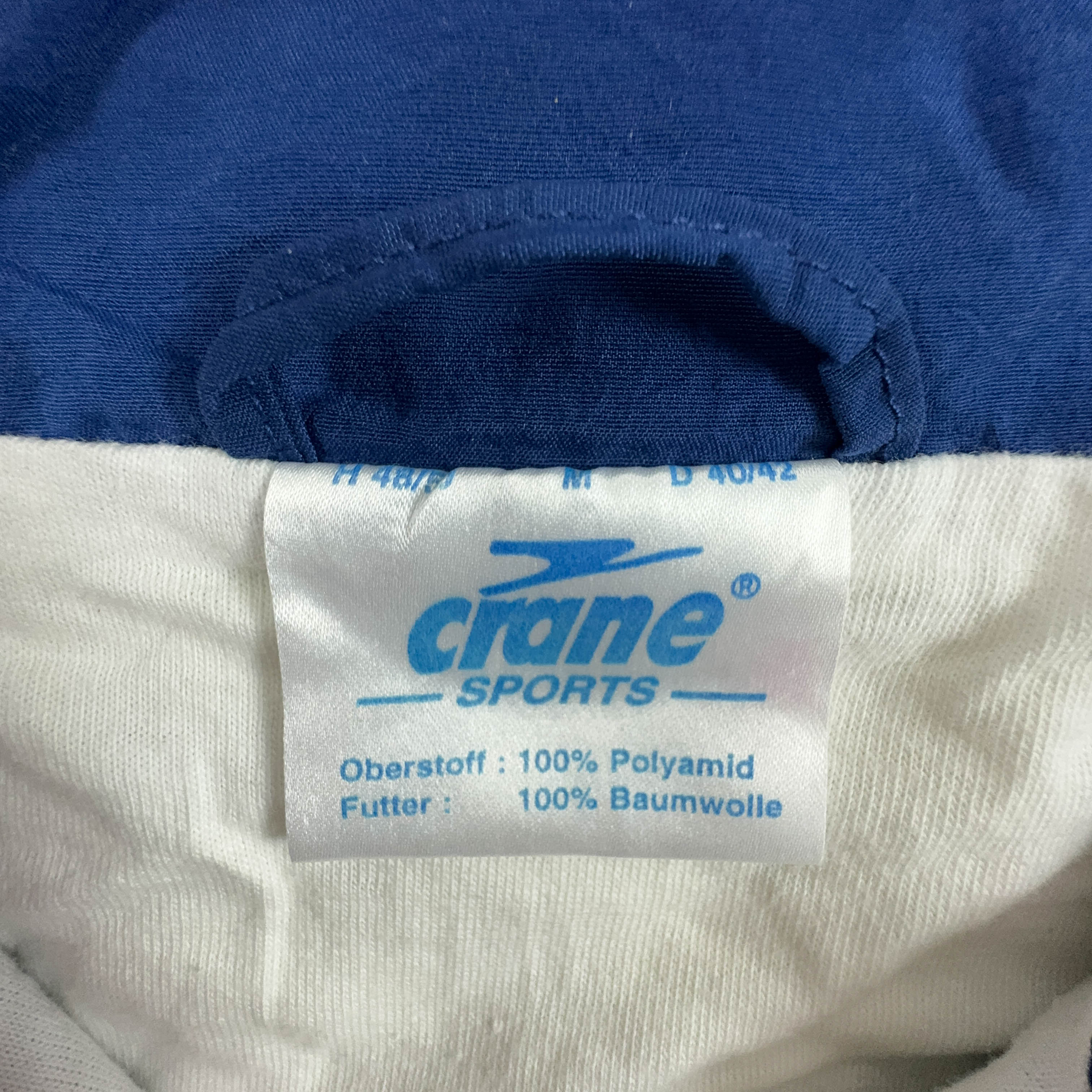 Giacca a vento Vintage bianca e blu quarter zip anni 80 90 - Taglia M/L uomo