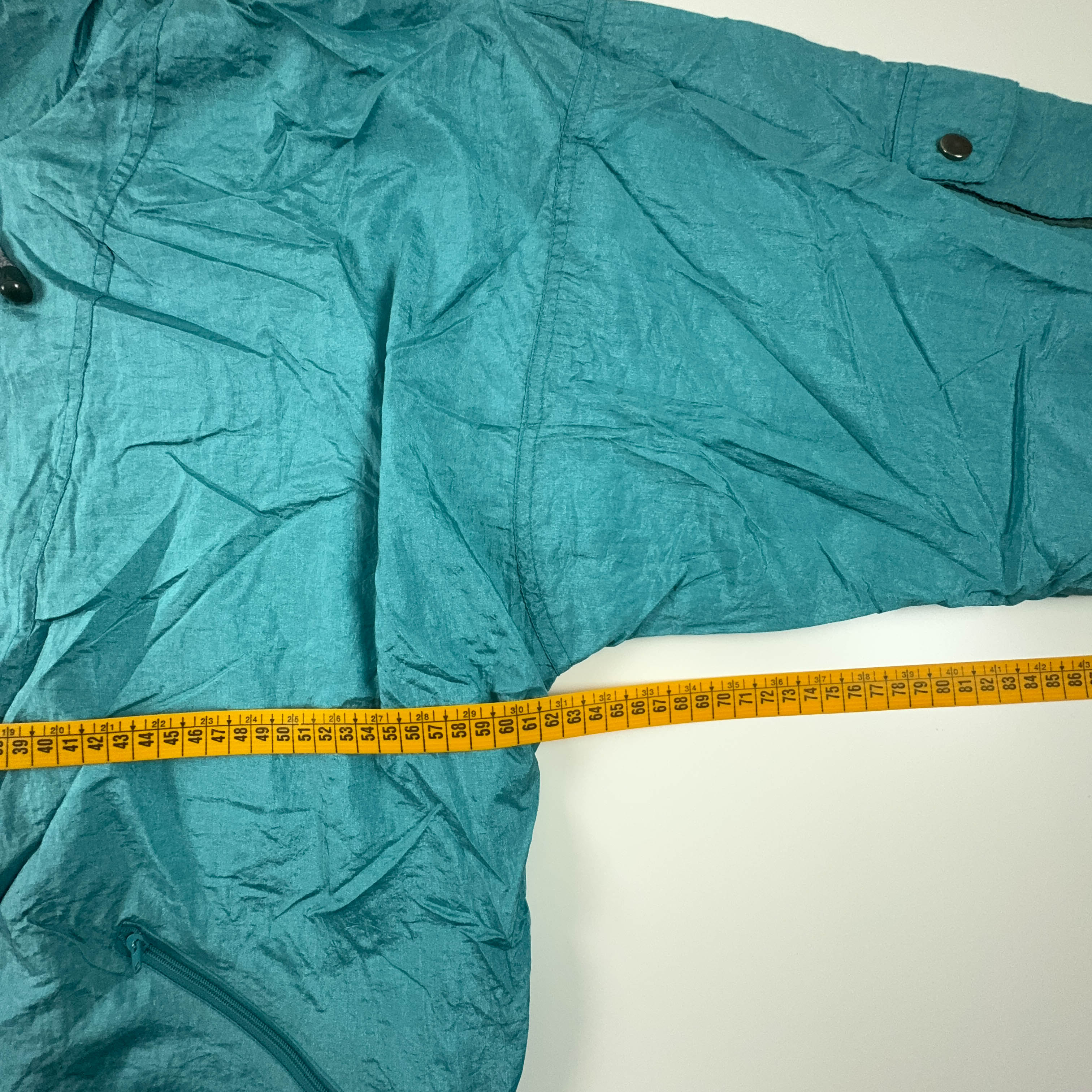 Giacca a vento Vintage azzurra con zip e cappuccio anni 90 - Taglia L uomo