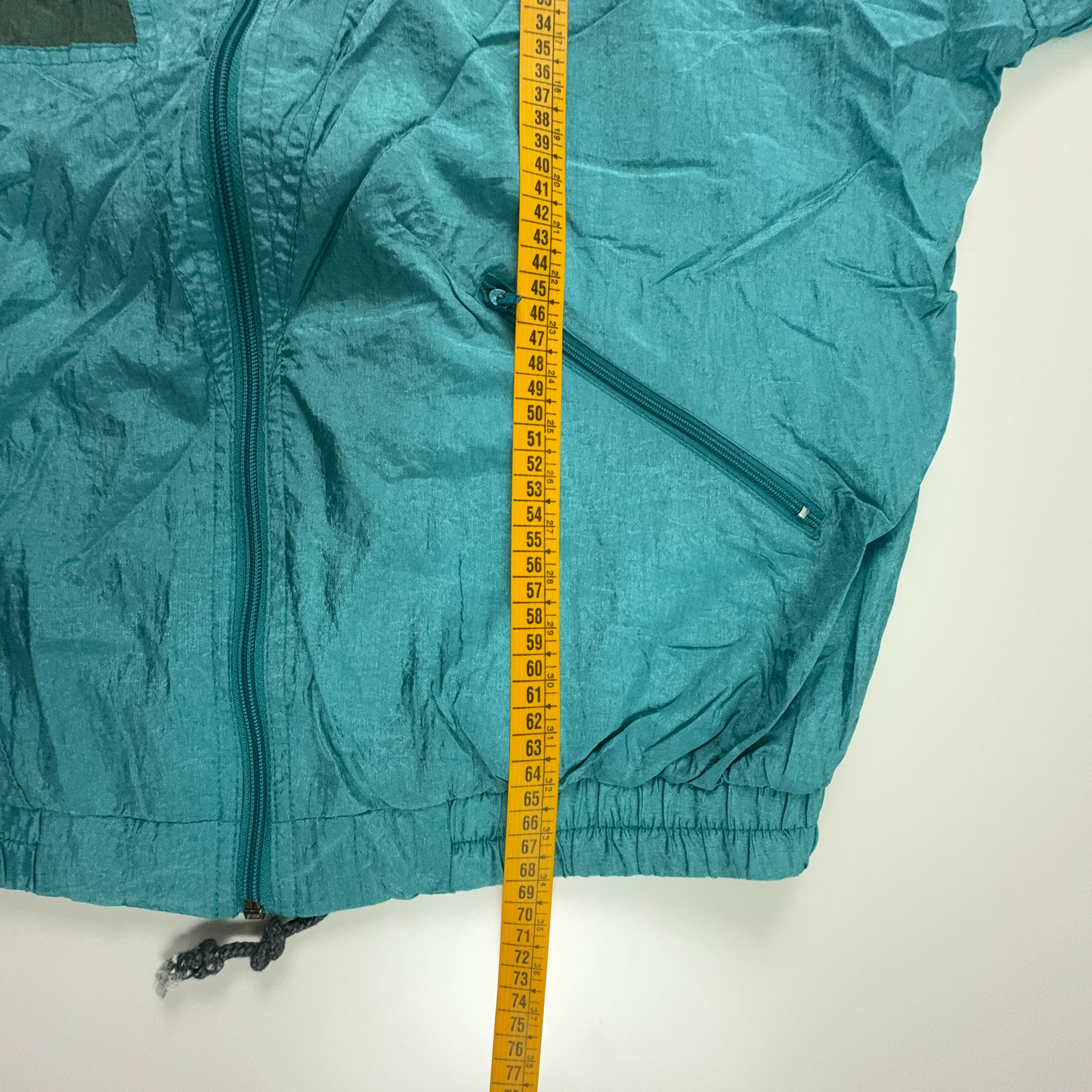Giacca a vento Vintage azzurra con zip e cappuccio anni 90 - Taglia L uomo
