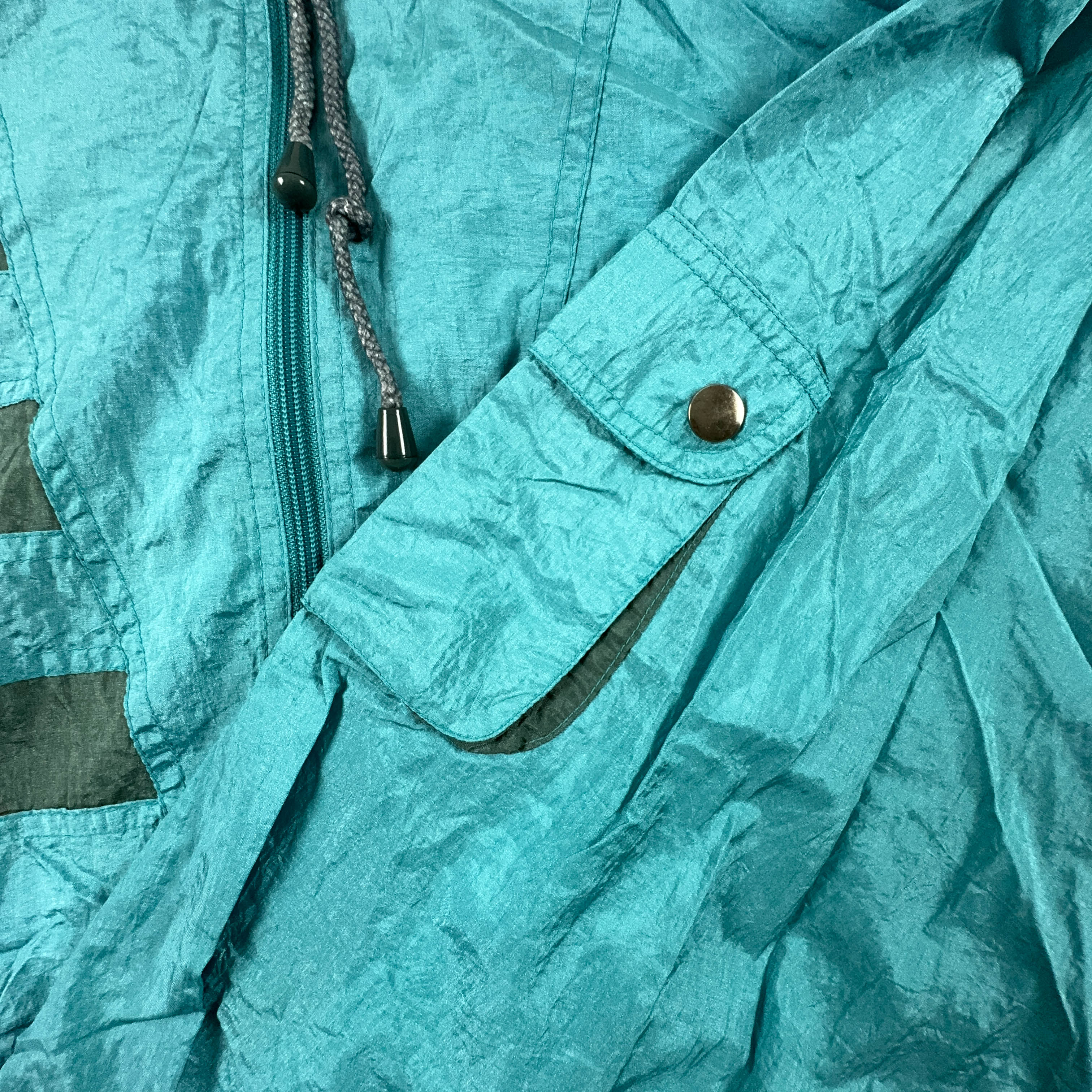 Giacca a vento Vintage azzurra con zip e cappuccio anni 90 - Taglia L uomo