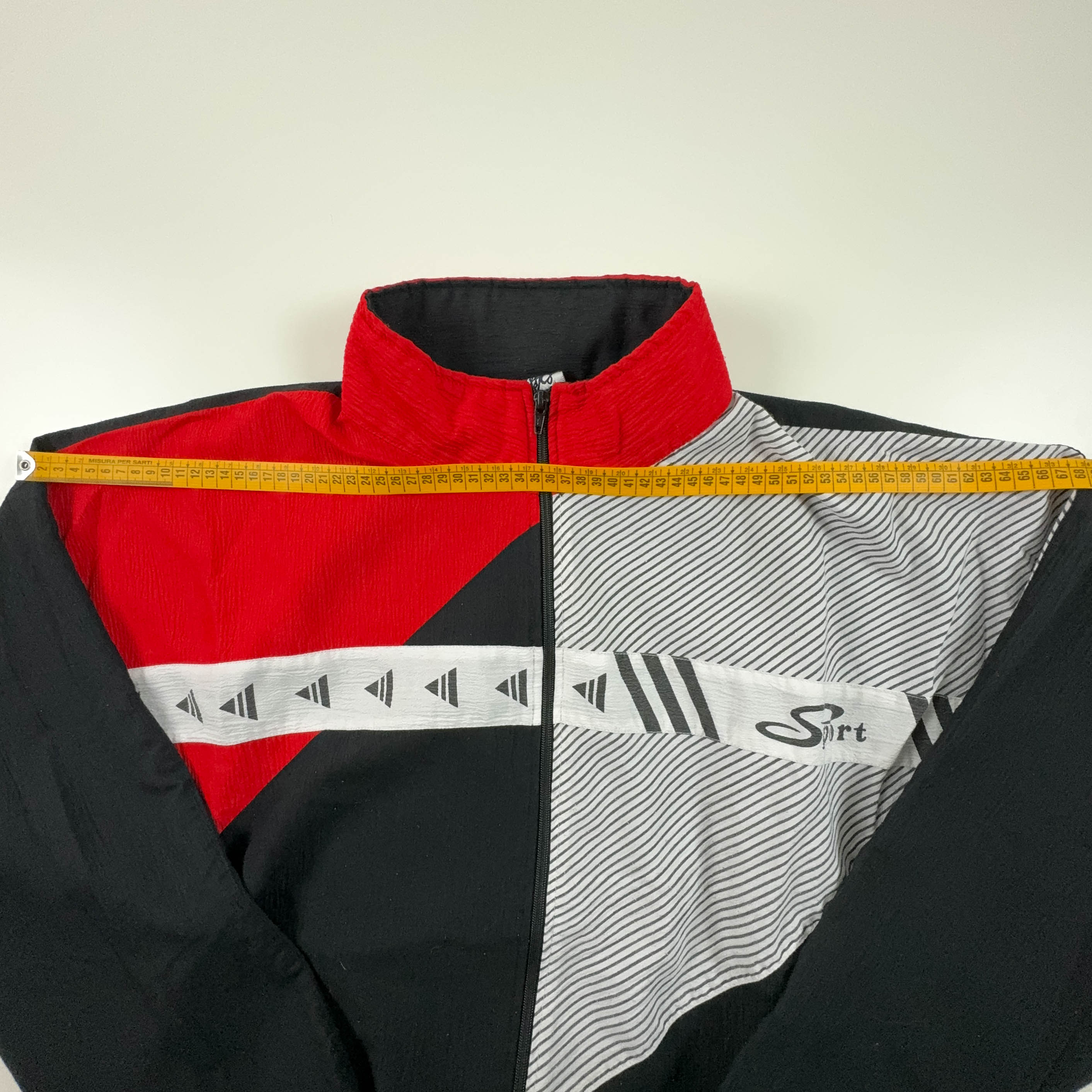 Giacca a vento Vintage nera e rossa geometrica con zip anni 90 - Taglia XL/XXL uomo