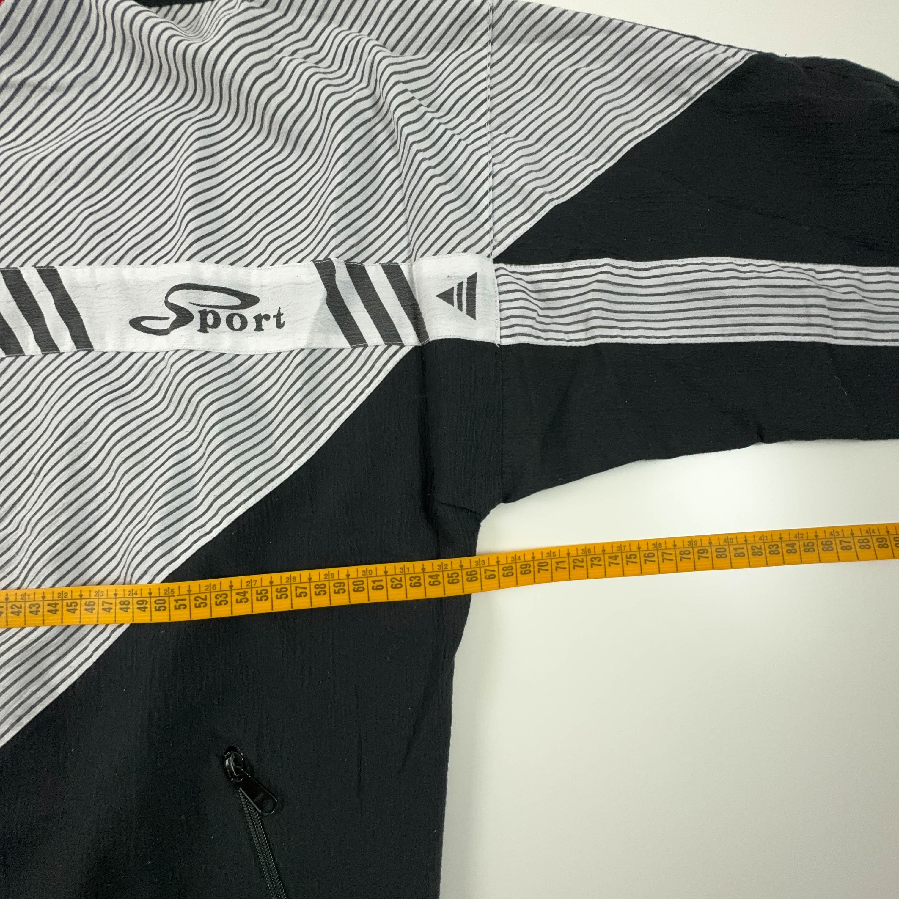 Giacca a vento Vintage nera e rossa geometrica con zip anni 90 - Taglia XL/XXL uomo