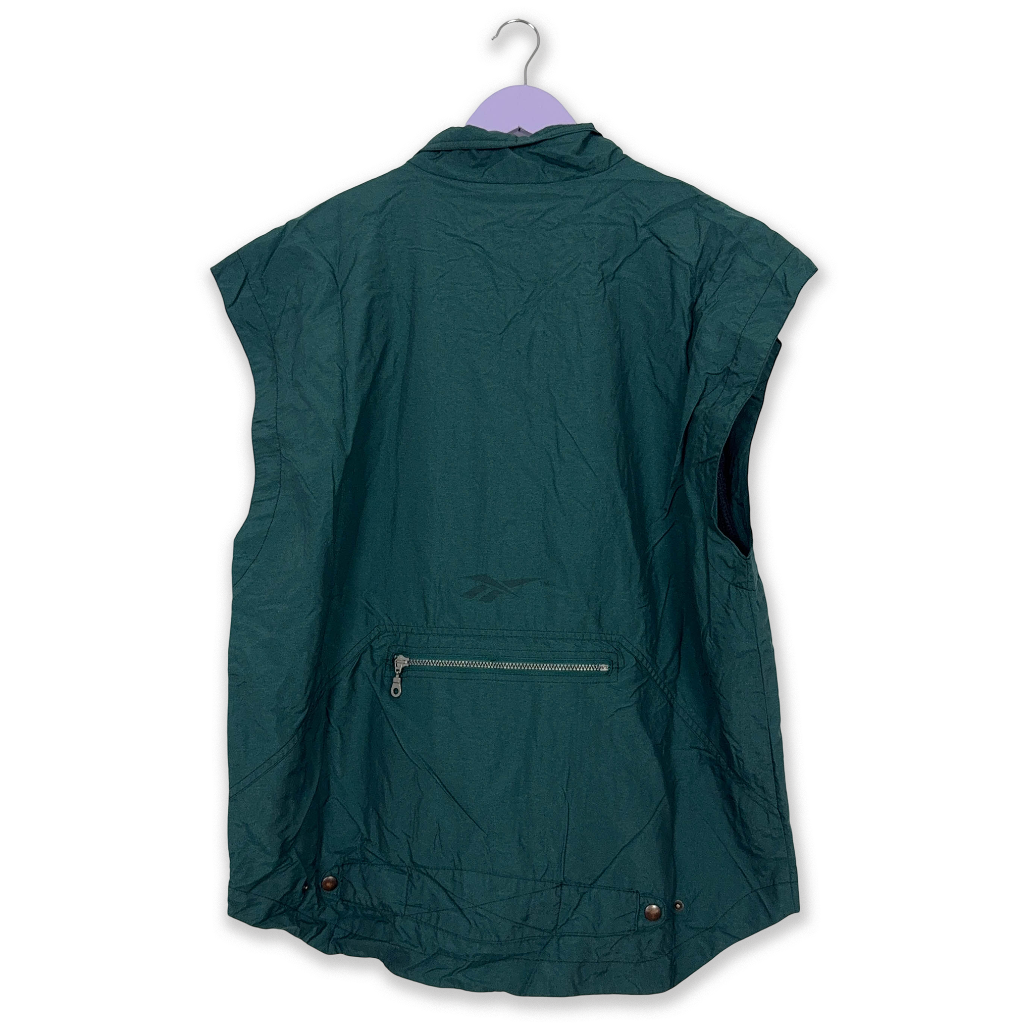 Giacca a vento Reebok Vintage smanicata verde scuro con zip anni 90 - Taglia L/XL uomo