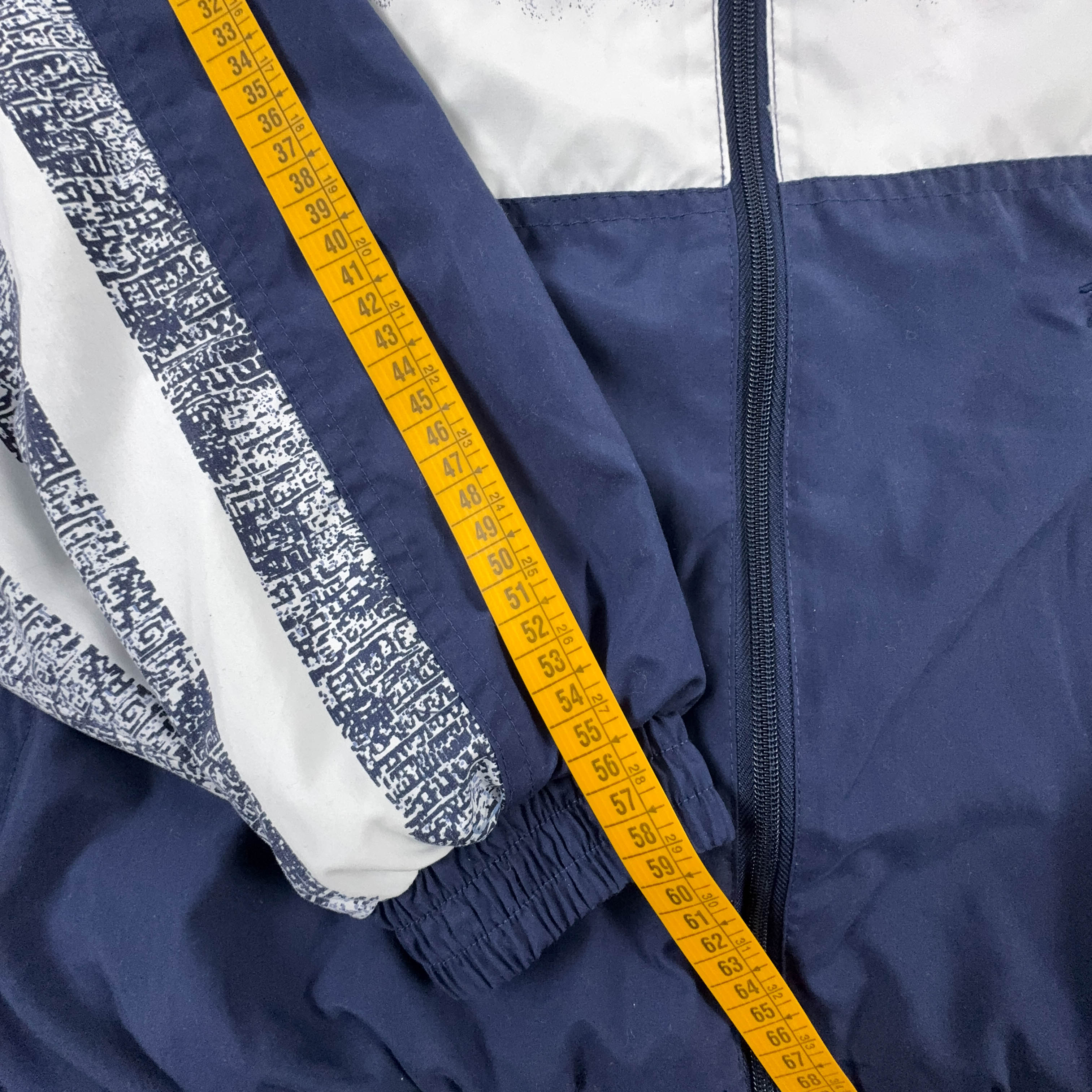 Giacca a vento Vintage blu e bianca a fantasia anni 90 - Taglia L/XL uomo